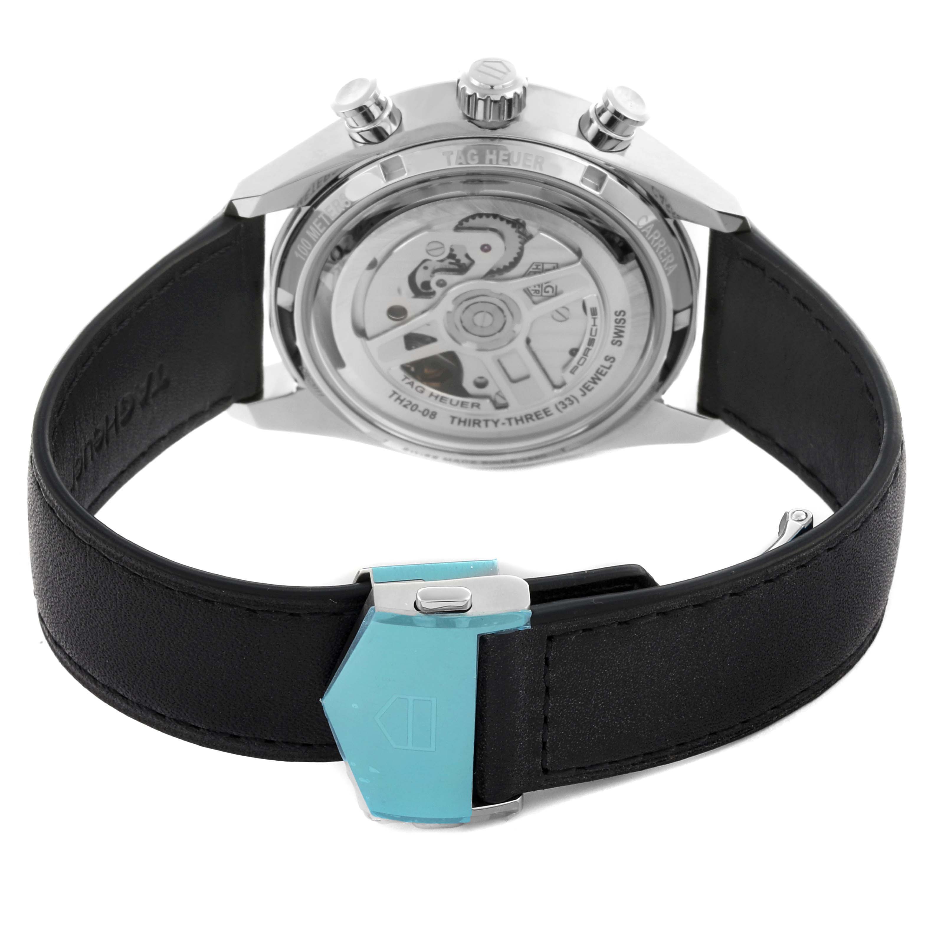 The image shows the back view of the Tag Heuer Carrera CBS2011.FC6529 Men's Stainless Steel Silver Dial CBS2011.FC6529 Men's Stainless Steel Silver Dial, highlighting the mechanism and black strap.