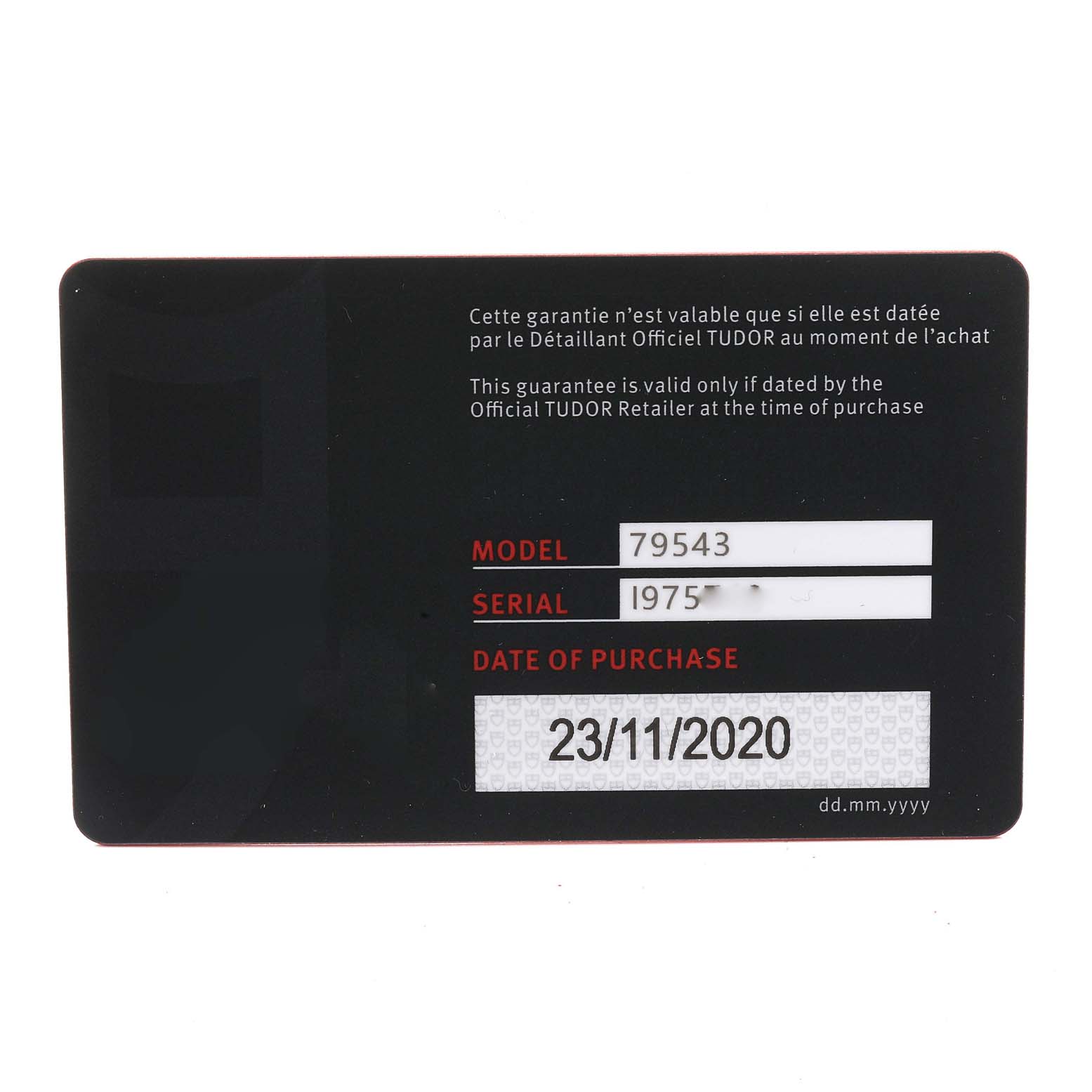 This image shows the warranty card for the Tudor Heritage Black Bay 79543 Men's Steel and Gold (two tone) Champagne Dial 79543 Men's Steel and Gold (two tone) Champagne Dial model 79543, displaying the serial number and date of purchase.