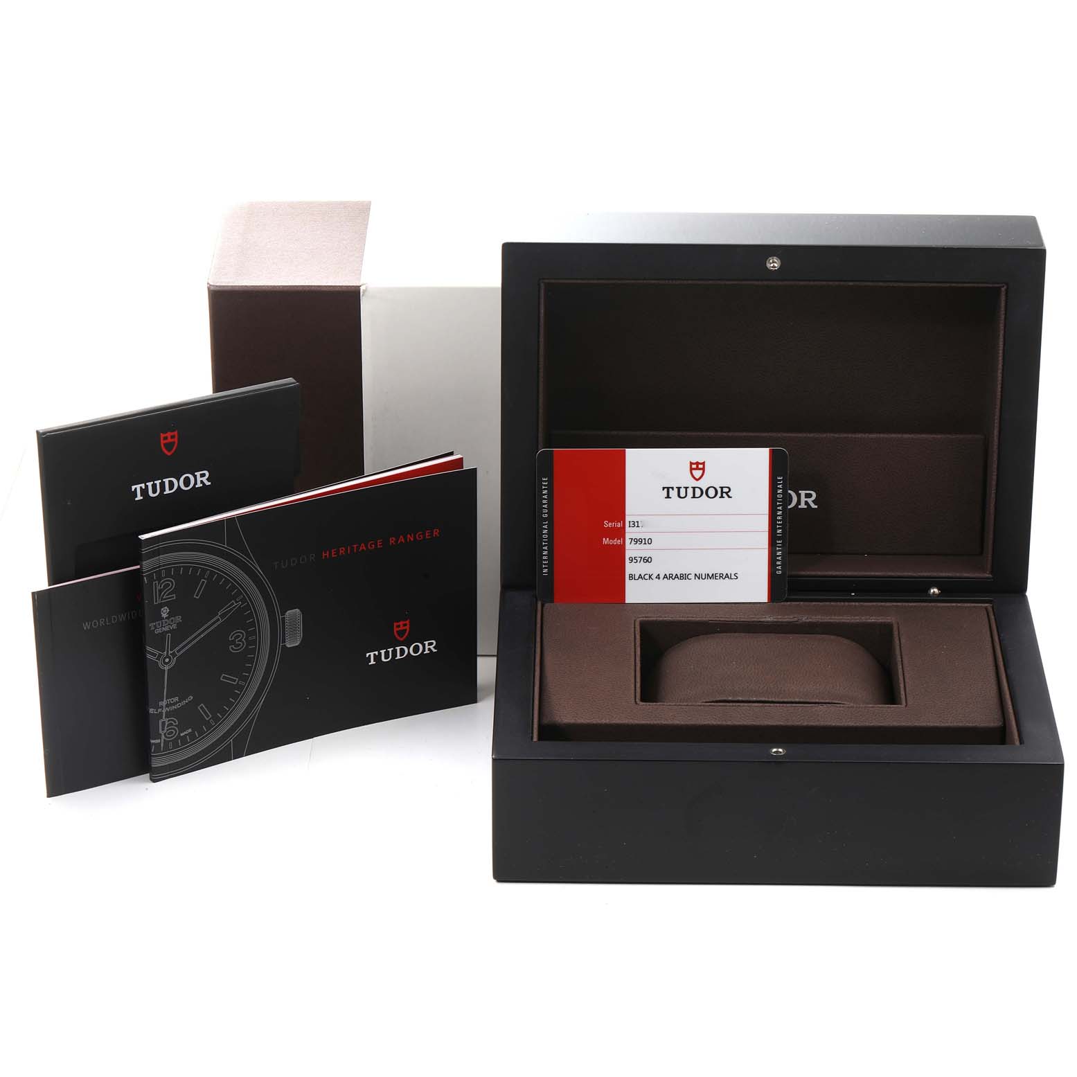 The image shows the packaging, warranty card, manuals, and display box for the Tudor Heritage Ranger 79910 Men's Stainless Steel Black Dial 79910 Men's Stainless Steel Black Dial watch.
