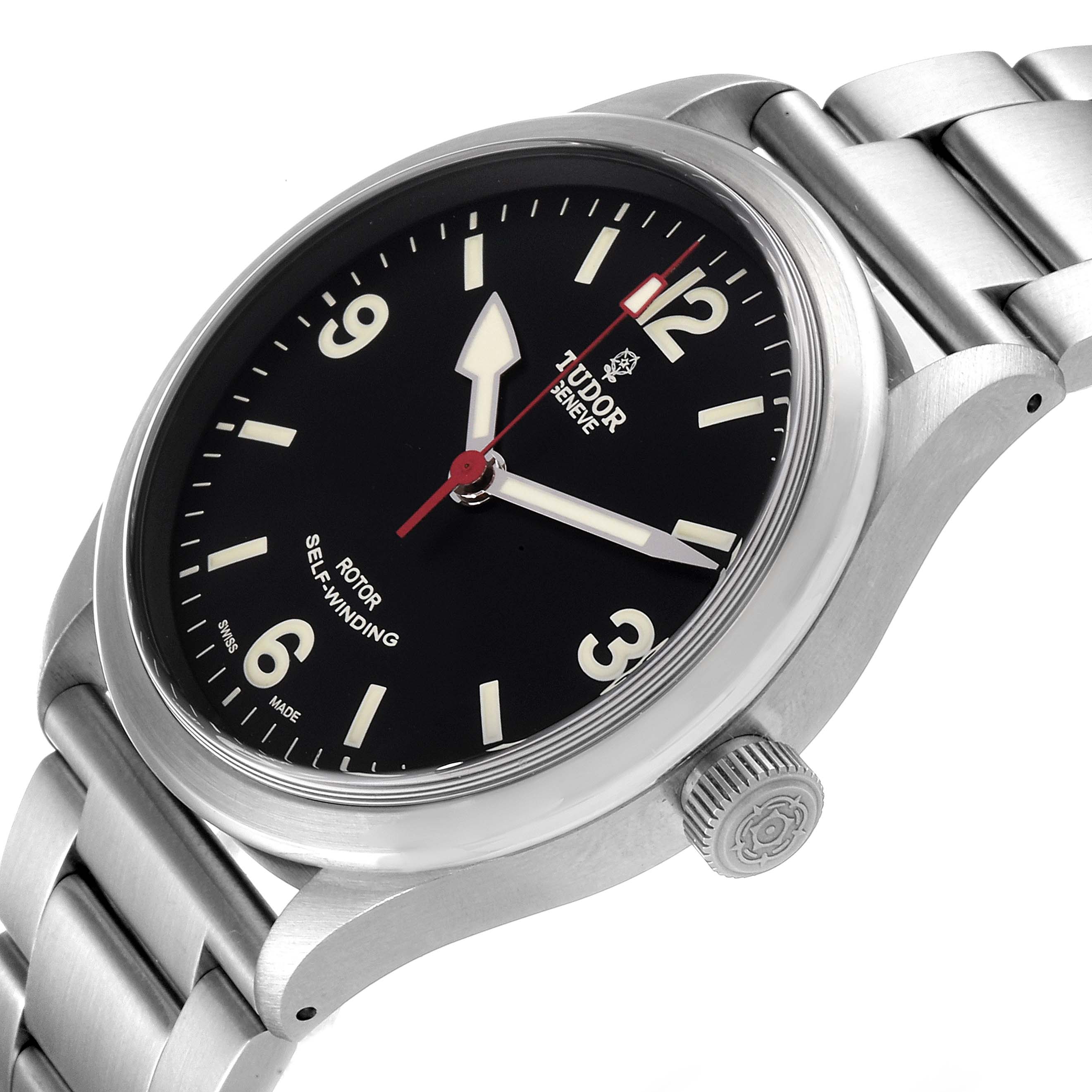 The Tudor Heritage Ranger 79910 Men's Stainless Steel Black Dial 79910 Men's Stainless Steel Black Dial watch is shown at an angled view, displaying the face, bezel, crown, and part of the stainless steel bracelet.