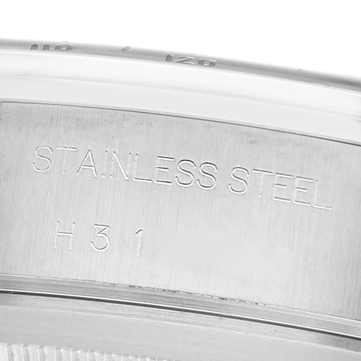 The image shows a close-up of the stainless steel case with engravings for the Tudor Prince 79280 Men's Stainless Steel Silver Dial model.