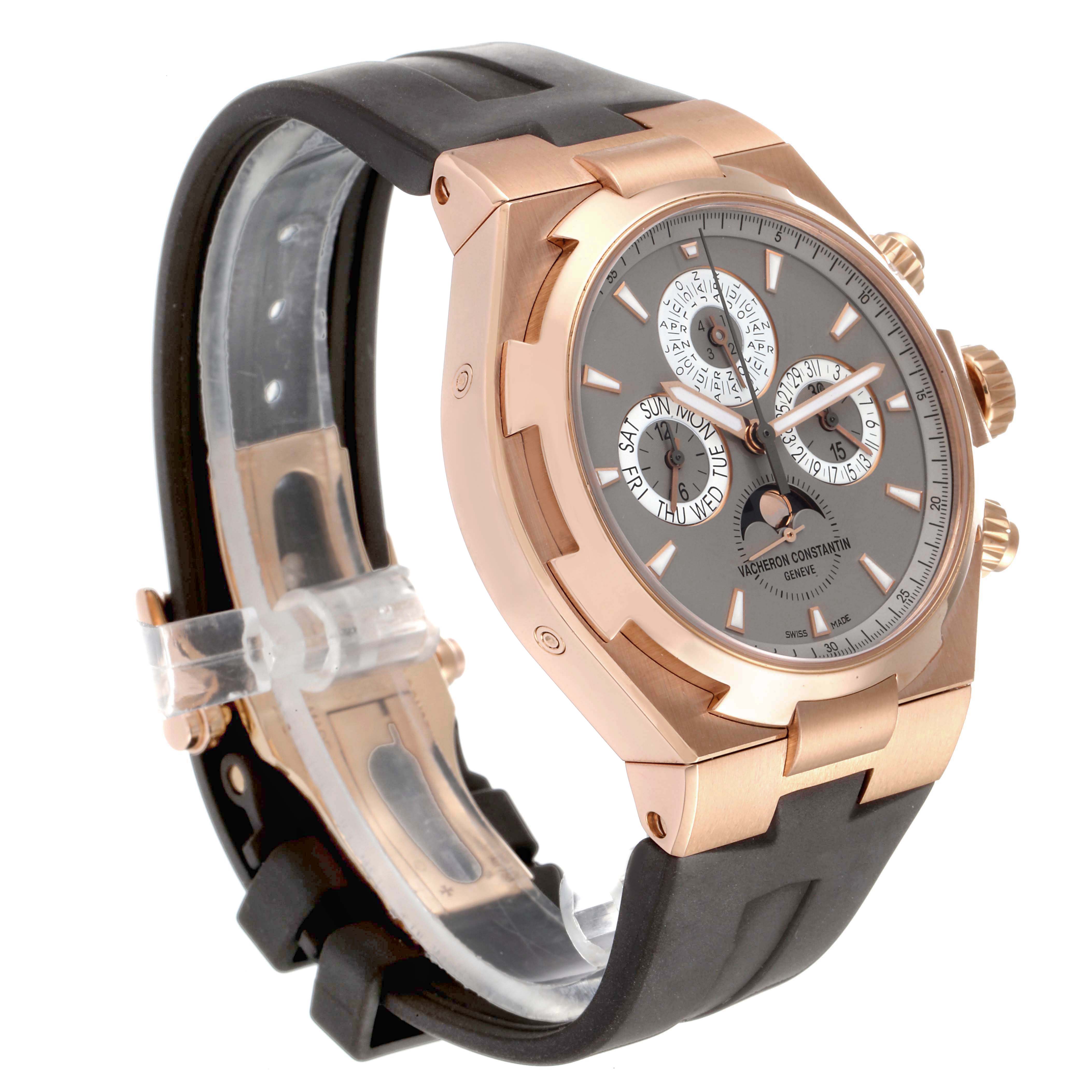 The image shows a side angle of the Vacheron Constantin Overseas 49020/000R-9753 Men's Rose Gold Brown Dial 49020/000R-9753 Men's Rose Gold Brown Dial watch, highlighting its rose gold casing, multiple subdials, and black strap.