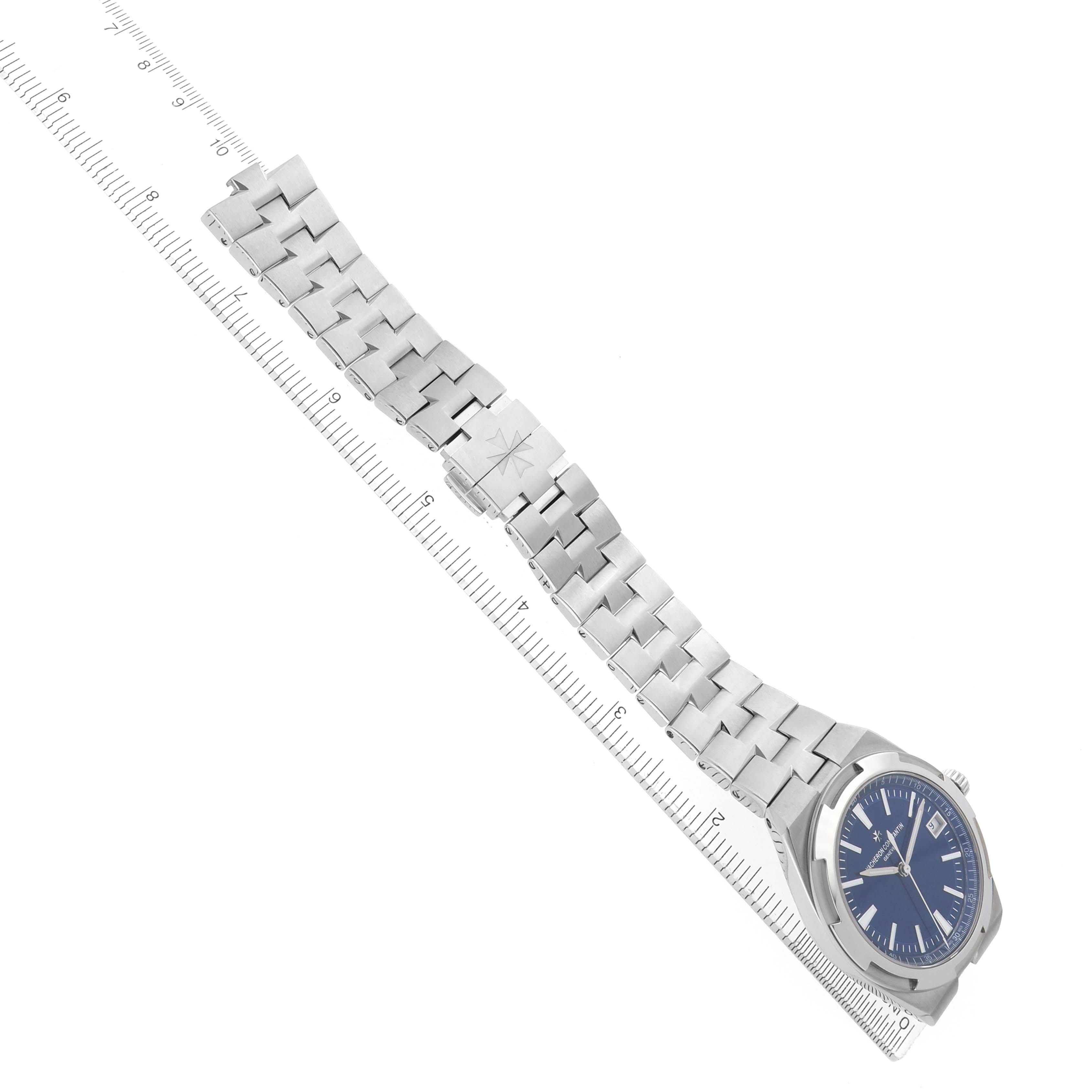 The Vacheron Constantin Overseas 4500V Men's Stainless Steel Blue Dial watch is shown at a slight angle, displaying the face, bezel, and full bracelet with a ruler for scale.