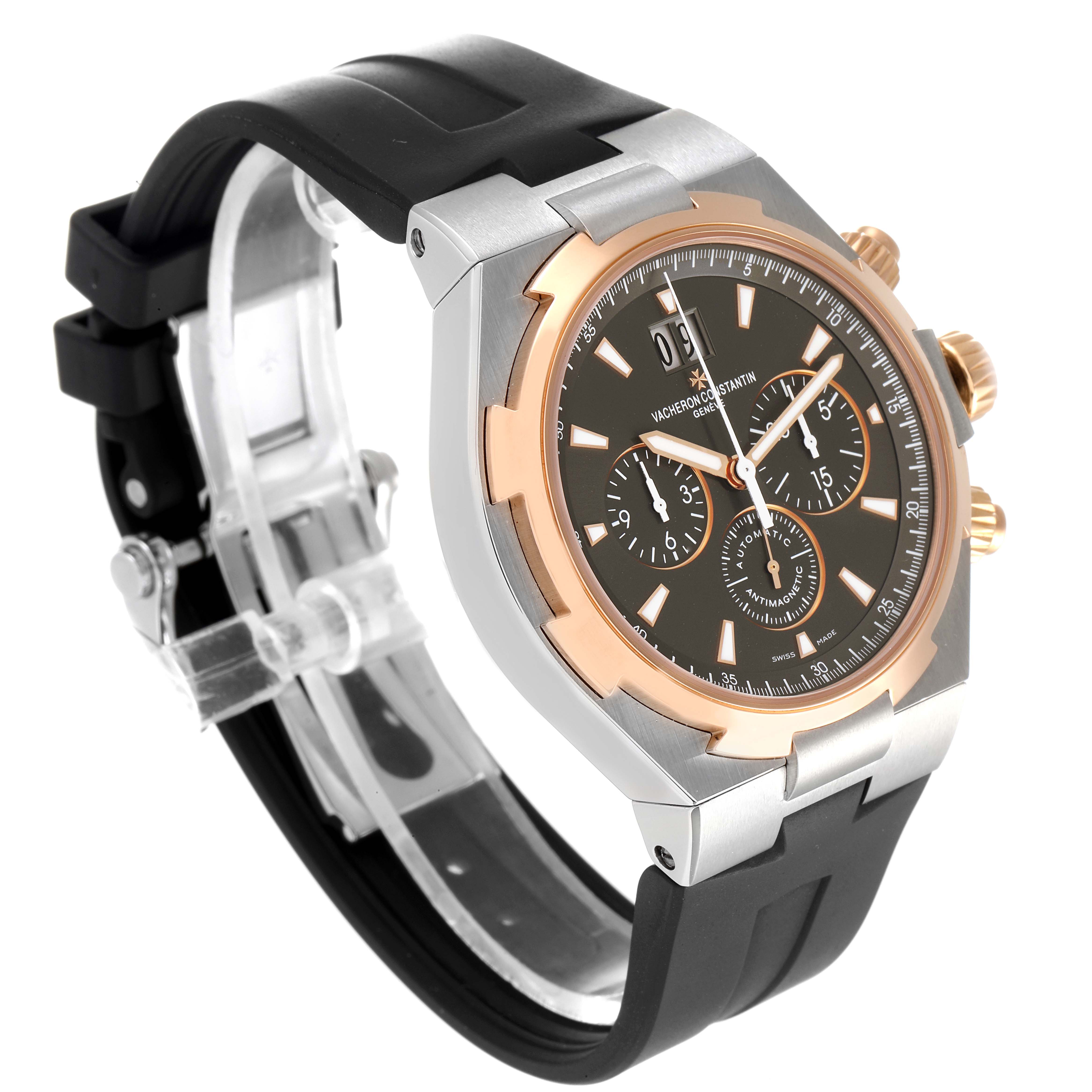 The Vacheron Constantin Overseas 49150/000M-9338 Men's Steel and Gold (two tone) Grey Dial 49150/000M-9338 Men's Steel and Gold (two tone) Grey Dial watch is shown from an angled side view, displaying the face, bezel, chronograph buttons, and strap. 