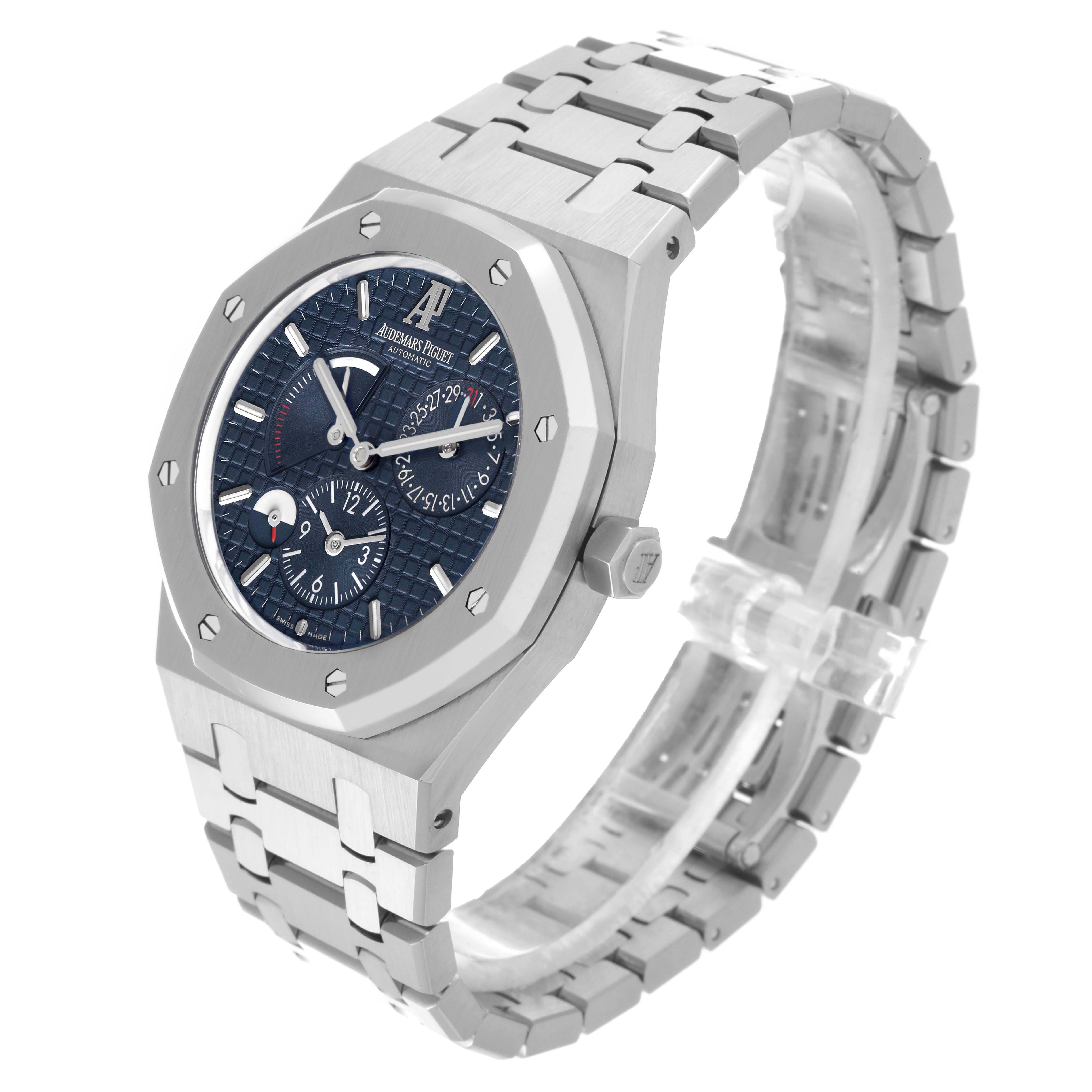 The Audemars Piguet Royal Oak 26120ST.00.1220ST.02 Men's Stainless Steel Blue Dial watch is shown at a slight angle, highlighting the blue dial, octagonal bezel, and stainless steel bracelet.