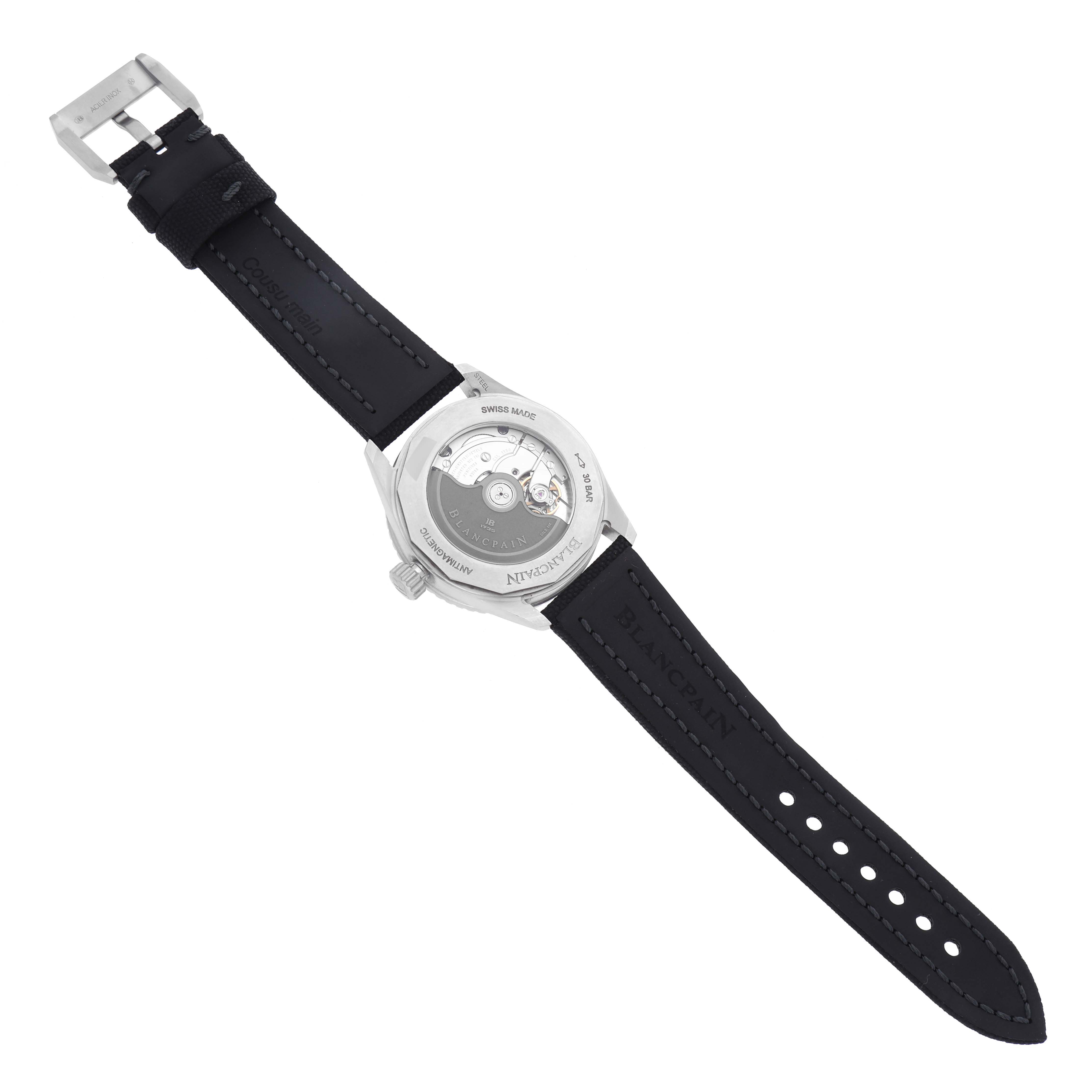 The Blancpain Fifty Fathoms 5100B-1110-B52A Men's Stainless Steel Grey Dial 5100B-1110-B52A Men's Stainless Steel Grey Dial watch is shown from the back, highlighting the exhibition case back and the leather strap.