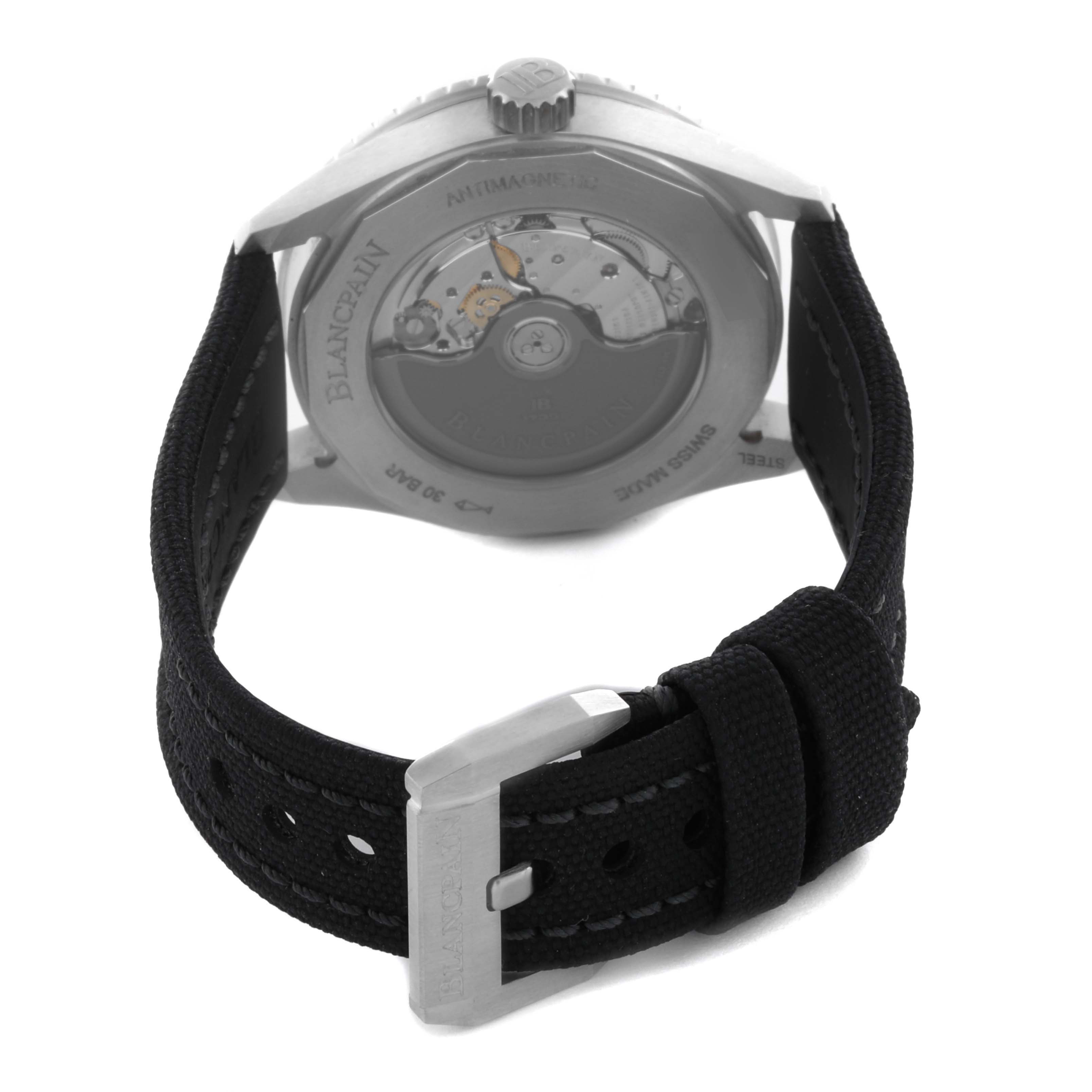 The image shows the Blancpain Fifty Fathoms 5100B-1110-B52A Men's Stainless Steel Grey Dial 5100B-1110-B52A Men's Stainless Steel Grey Dial watch from the back, highlighting the movement and strap with buckle.