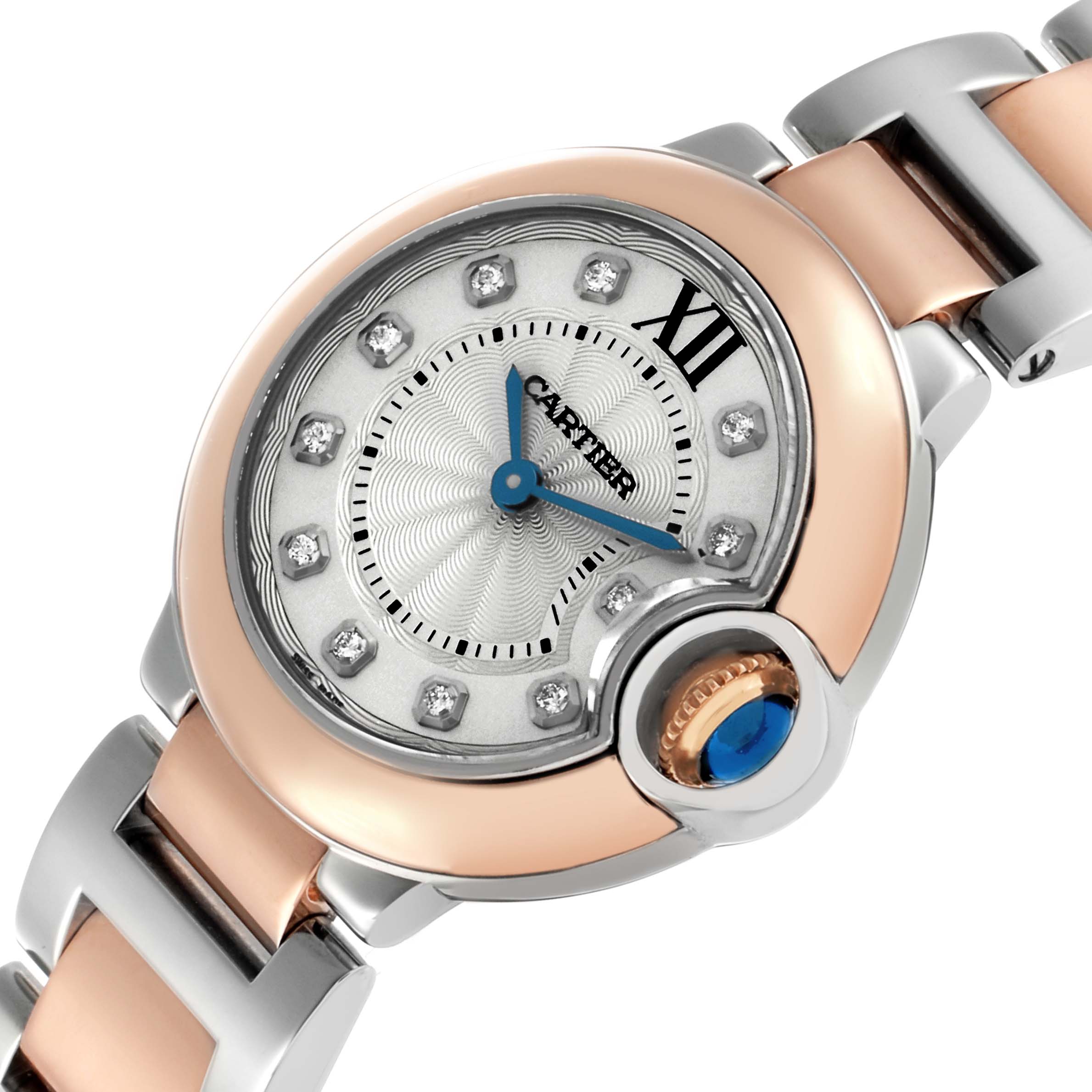 The Cartier Ballon Bleu W3BB0005 Women's Steel and Gold (two tone) Silver Dial watch is shown at an angled close-up, highlighting its dial, diamond markers, and crown.