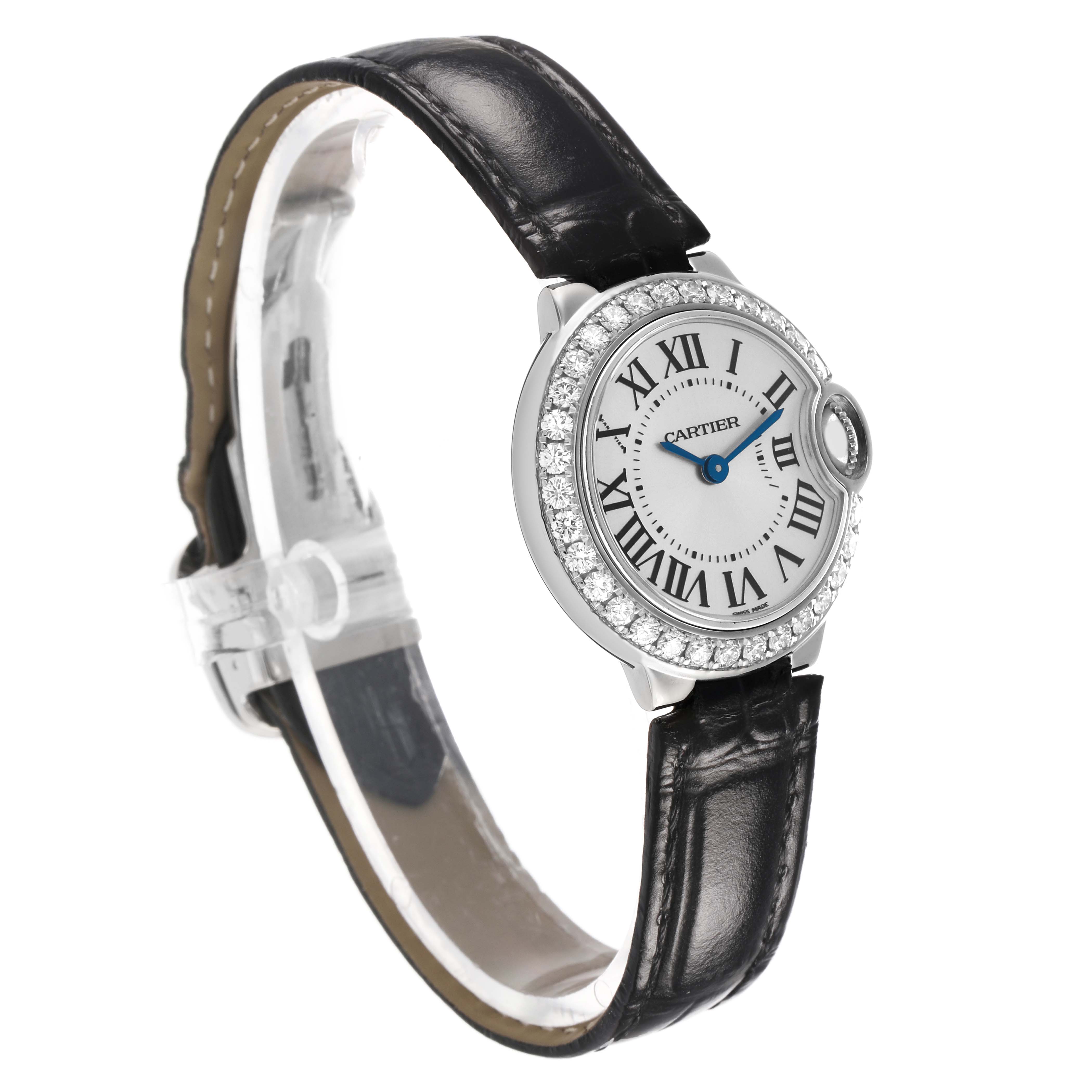 The Cartier Ballon Bleu WE900351 Women's White Gold Silver Dial watch is shown at a three-quarter angle, highlighting the face, diamond bezel, and leather strap.