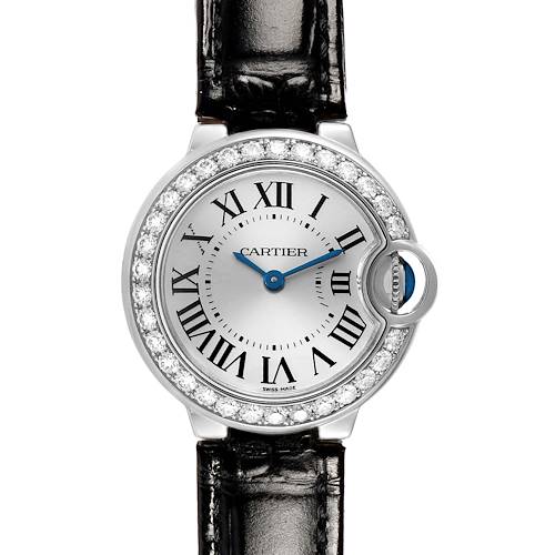 The Cartier Ballon Bleu WE900351 Women's White Gold Silver Dial watch is shown from a straight-on angle, highlighting its dial, bezel with diamonds, and black strap.