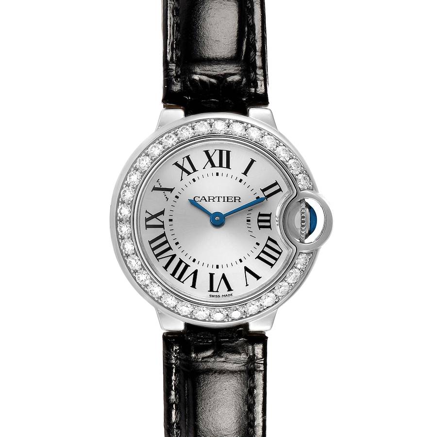 The Cartier Ballon Bleu WE900351 Women's White Gold Silver Dial watch is shown from a front angle, featuring its round face, Roman numerals, diamond bezel, and leather strap.