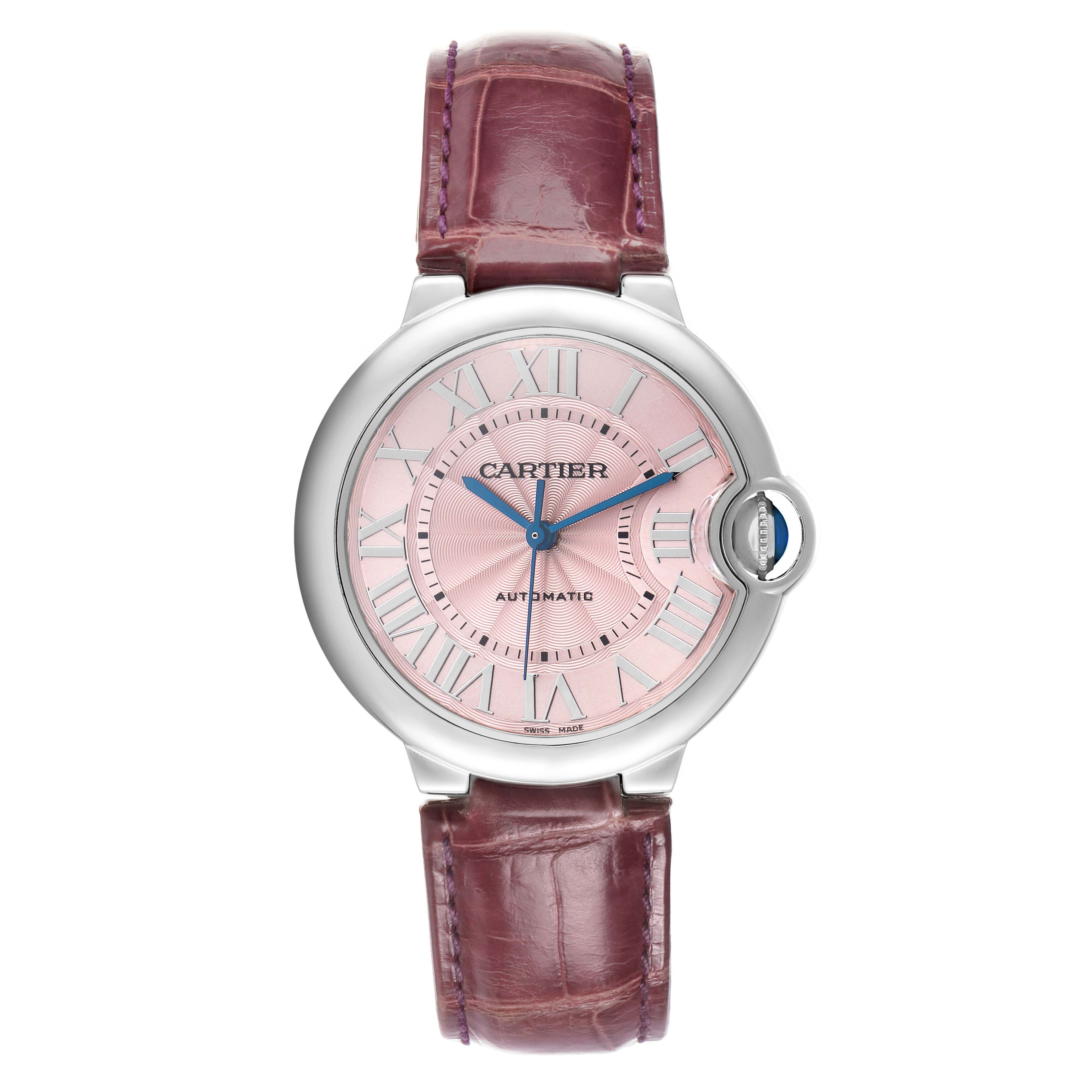 The Cartier Ballon Bleu WSBB0007 Women's Stainless Steel Pink Dial watch is shown from the front, featuring a pink dial, Roman numerals, and a leather strap.