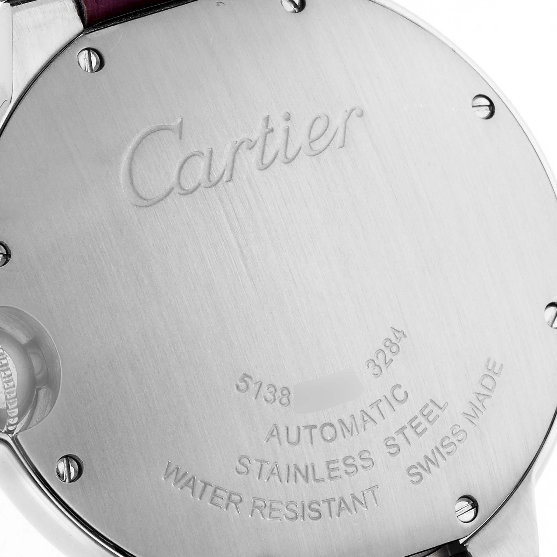 The image shows the back casing of the Cartier Ballon Bleu WSBB0007 Women's Stainless Steel Pink Dial watch, featuring the brand name, model details, and screws.