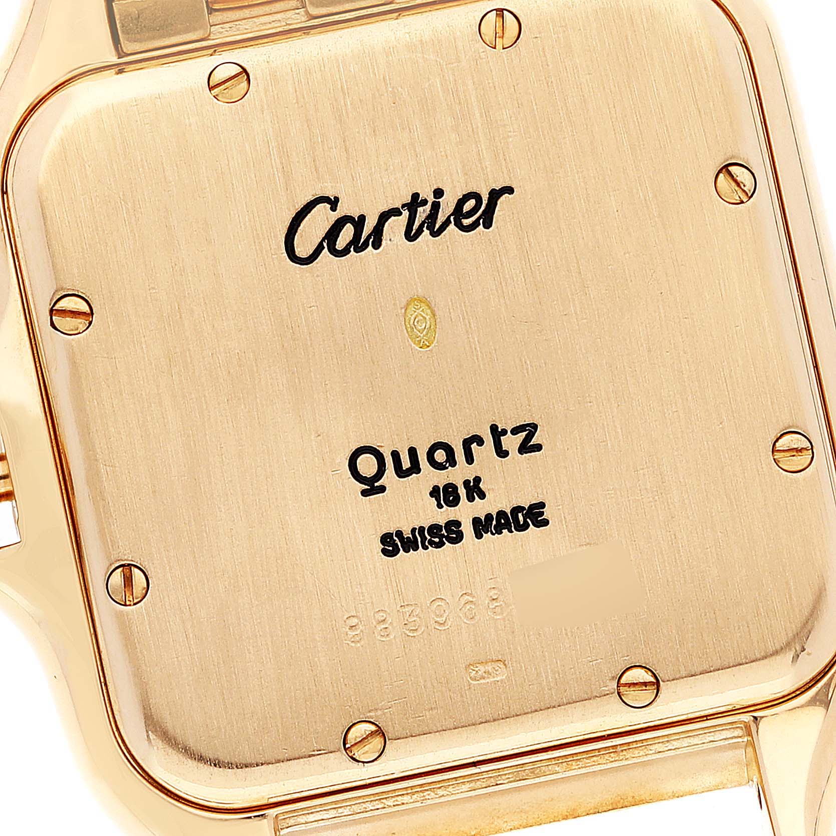The image shows the back case of a Cartier Panthere W25014B9 Men
s Yellow Gold Silver Dial W25014B9 Men
s Yellow Gold Silver Dial watch with engravings and screws visible.