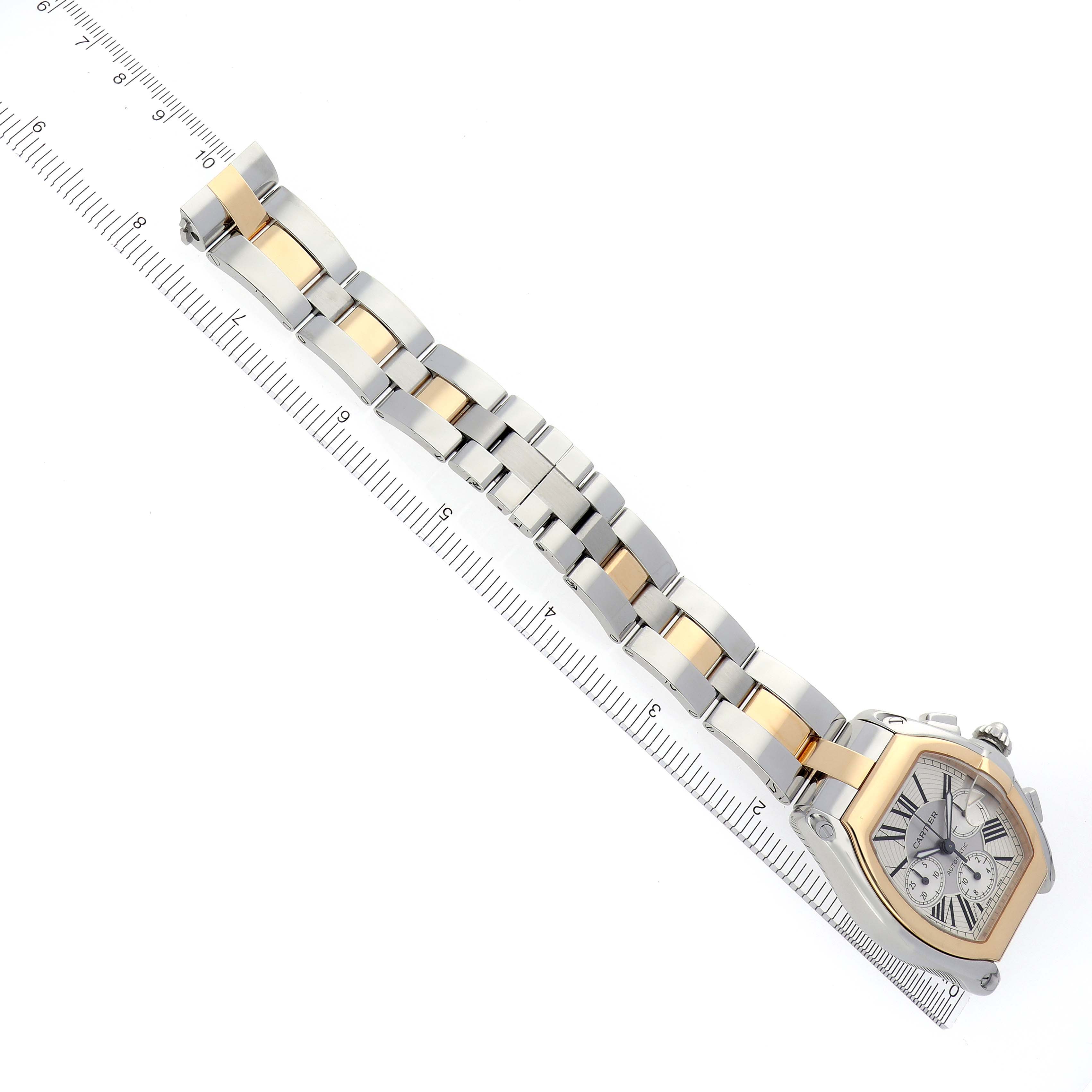 The Cartier Roadster W62027Z1 Men's Steel and Gold (two tone) Silver Dial W62027Z1 Men's Steel and Gold (two tone) Silver Dial watch is shown diagonally with its face and full bracelet visible.