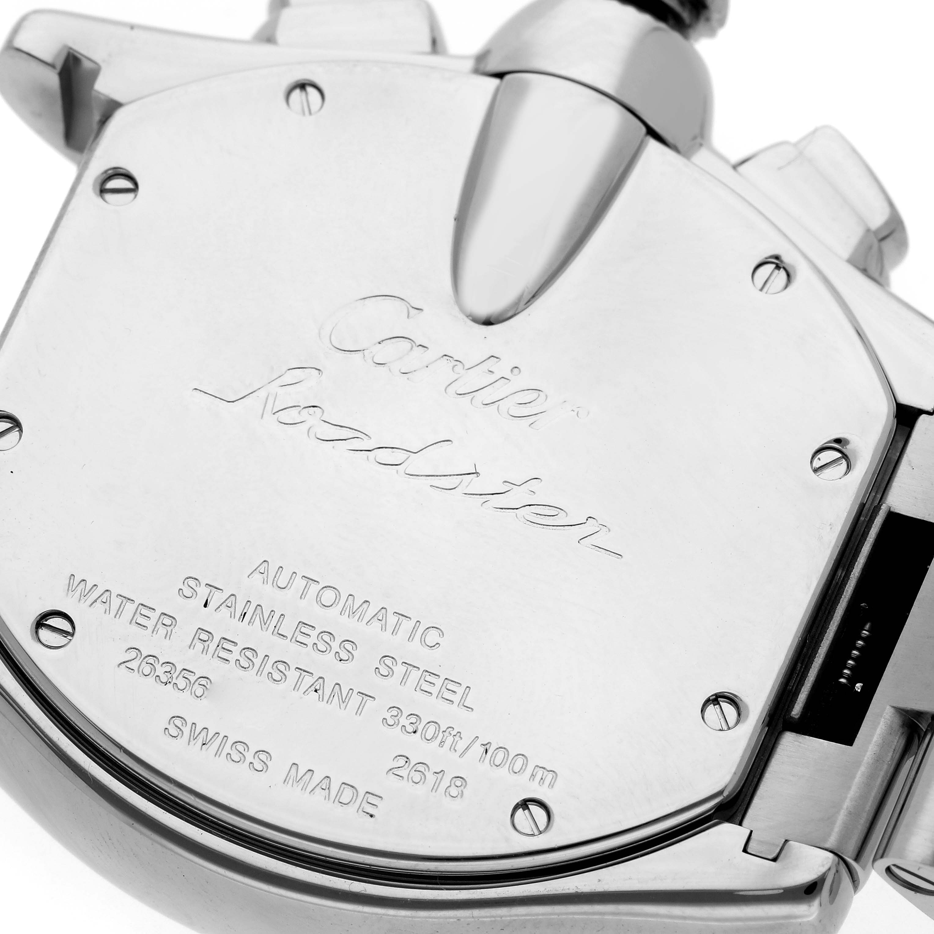 The image shows the back case of the Cartier Roadster W62019X6 Men's Stainless Steel Silver Dial W62019X6 Men's Stainless Steel Silver Dial watch, displaying engravings and its attachment lugs.