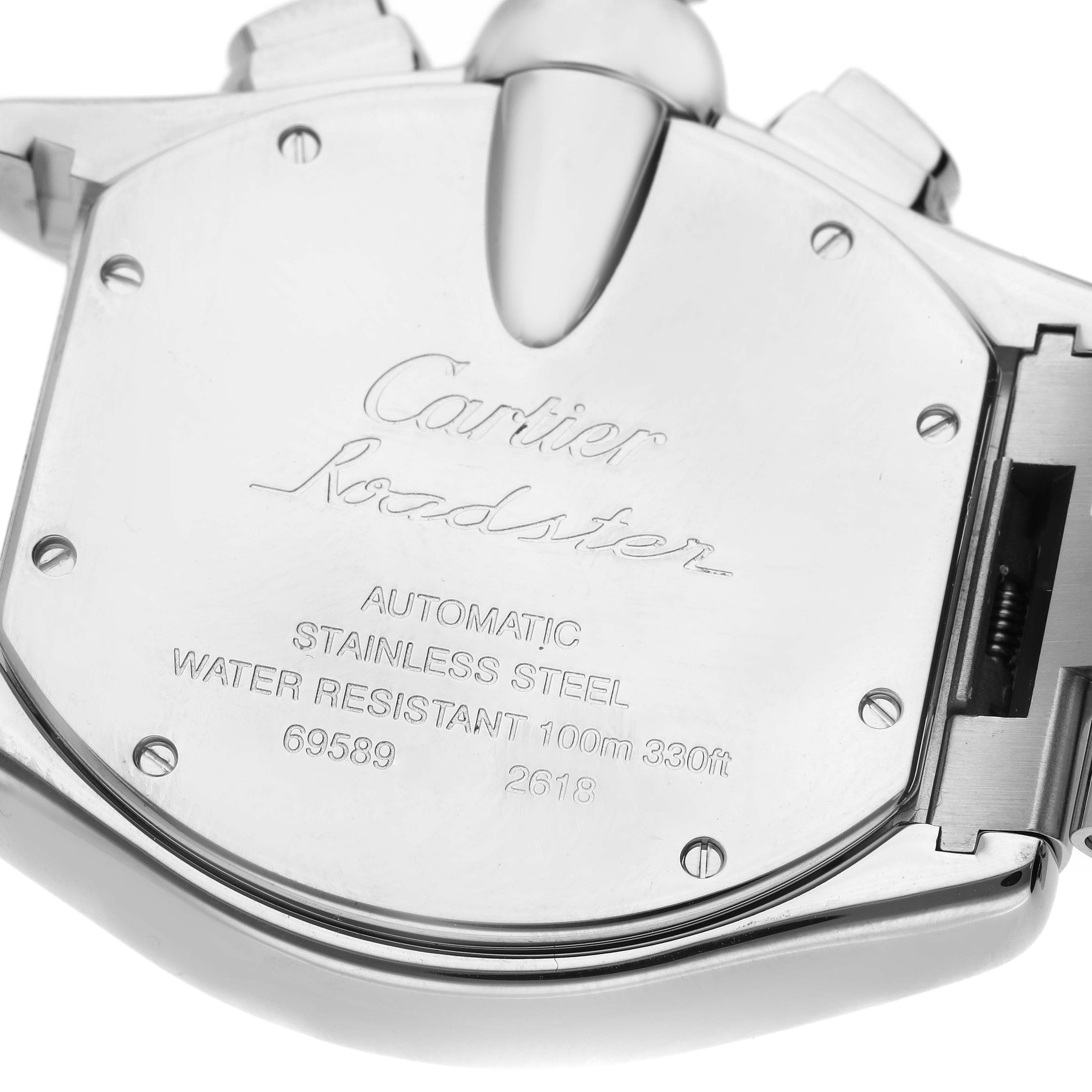 The image shows the back case of a Cartier Roadster W62020X6 Men's Stainless Steel Black Dial W62020X6 Men's Stainless Steel Black Dial watch, highlighting the engravings and metal details.