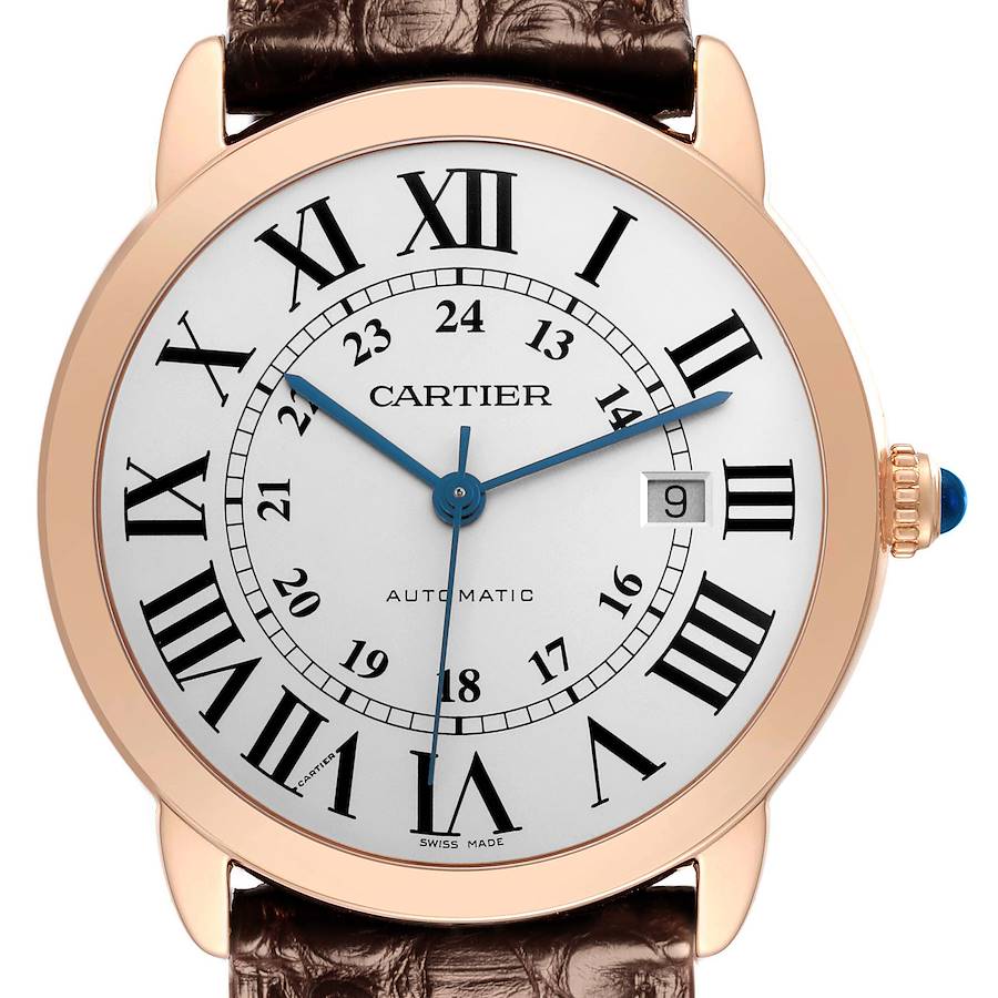 The Cartier Ronde watch is shown from the front, highlighting the dial, Roman numerals, hands, and crown with a blue sapphire.