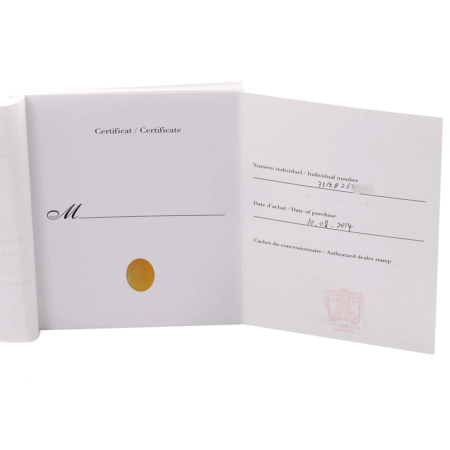 The image shows the open warranty booklet for the Cartier Ronde W6701009 Men's Steel and Gold (two tone) Silver Dial W6701009 Men's Steel and Gold (two tone) Silver Dial model, displaying certificate details and purchase information.