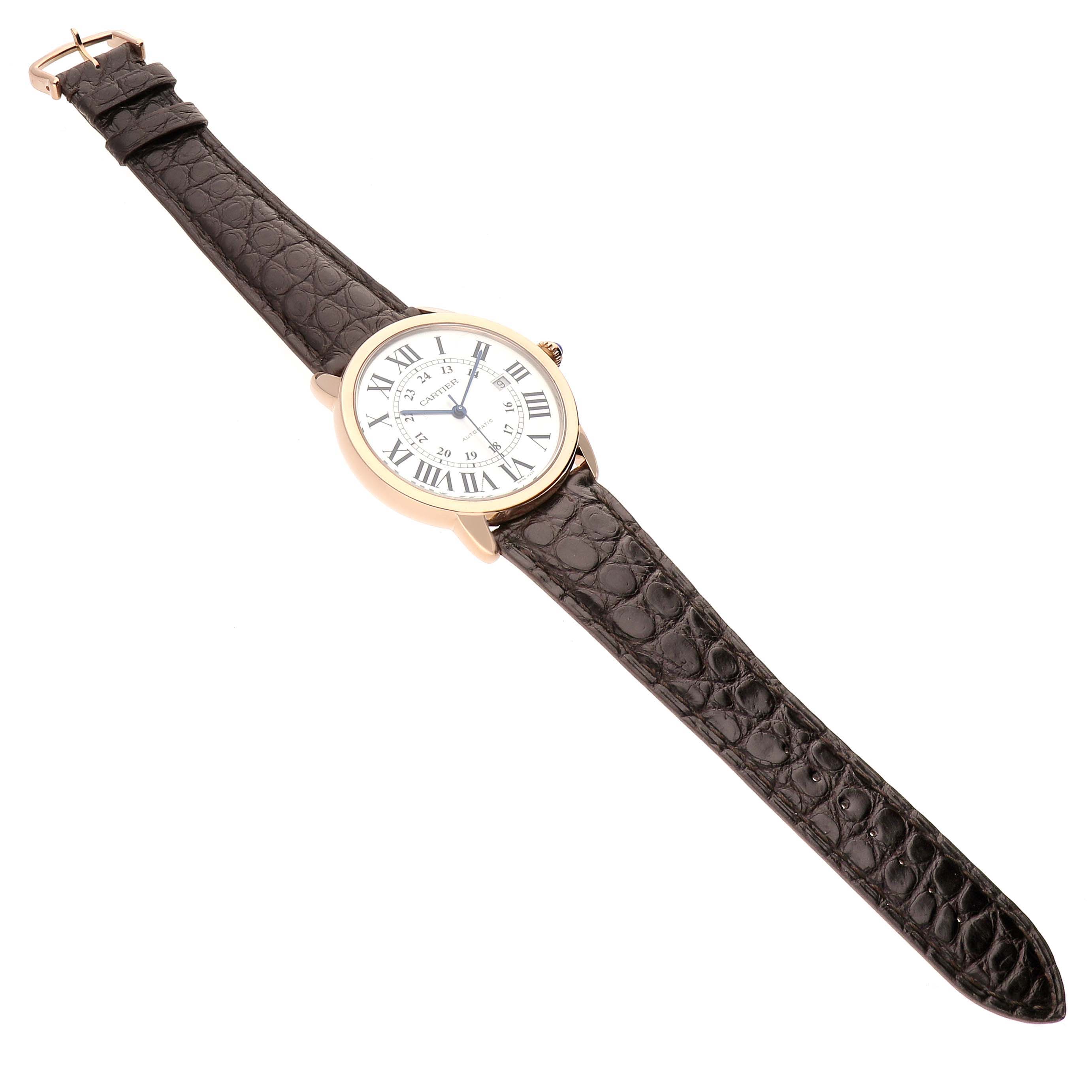 The Cartier Ronde W6701009 Men's Steel and Gold (two tone) Silver Dial W6701009 Men's Steel and Gold (two tone) Silver Dial watch is shown from a top-down angle, displaying its round face and leather strap fully extended.