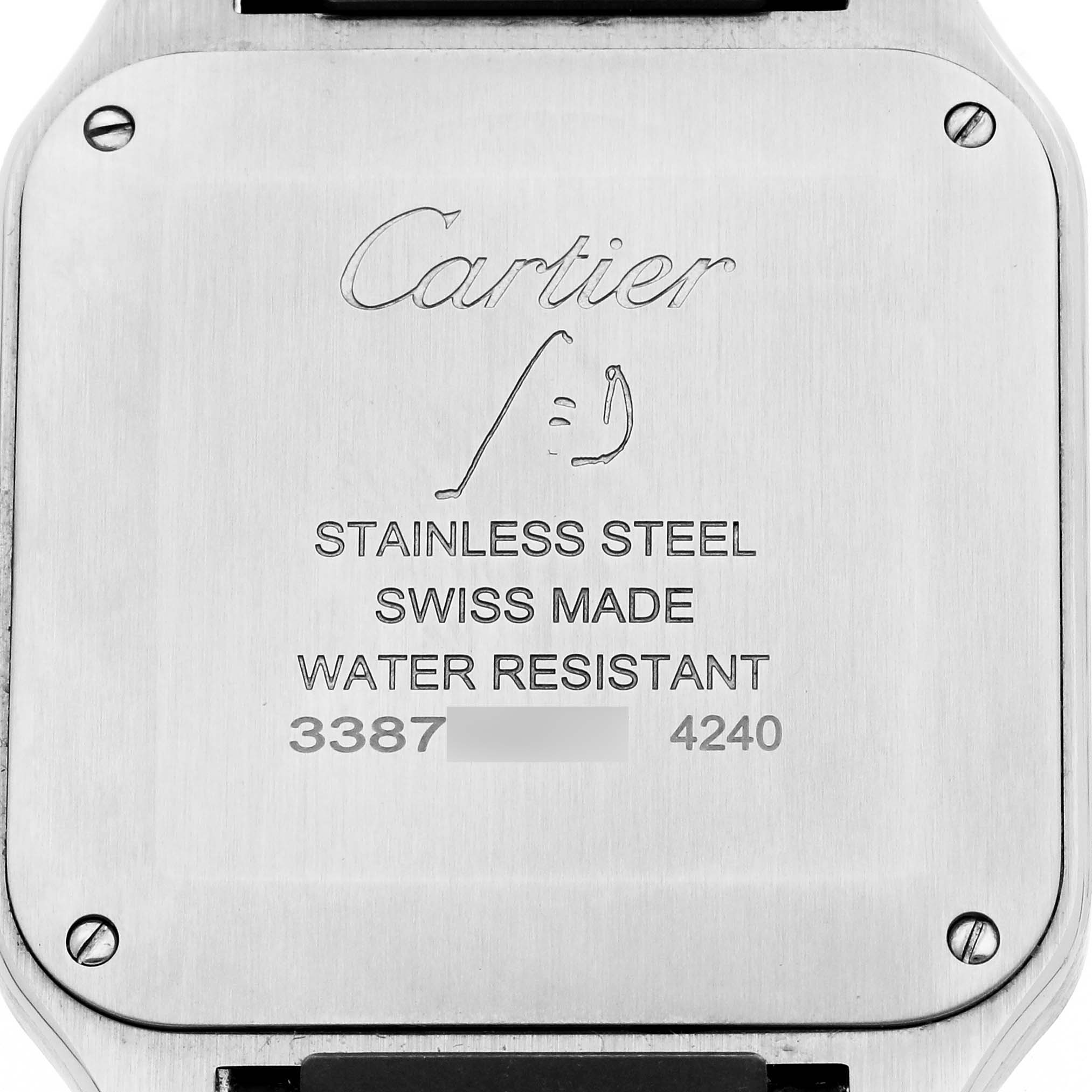 The image shows the back case of the Cartier Santos Dumont WSSA0022 Men
s Stainless Steel Silver Dial WSSA0022 Men
s Stainless Steel Silver Dial watch, highlighting engravings and screws.