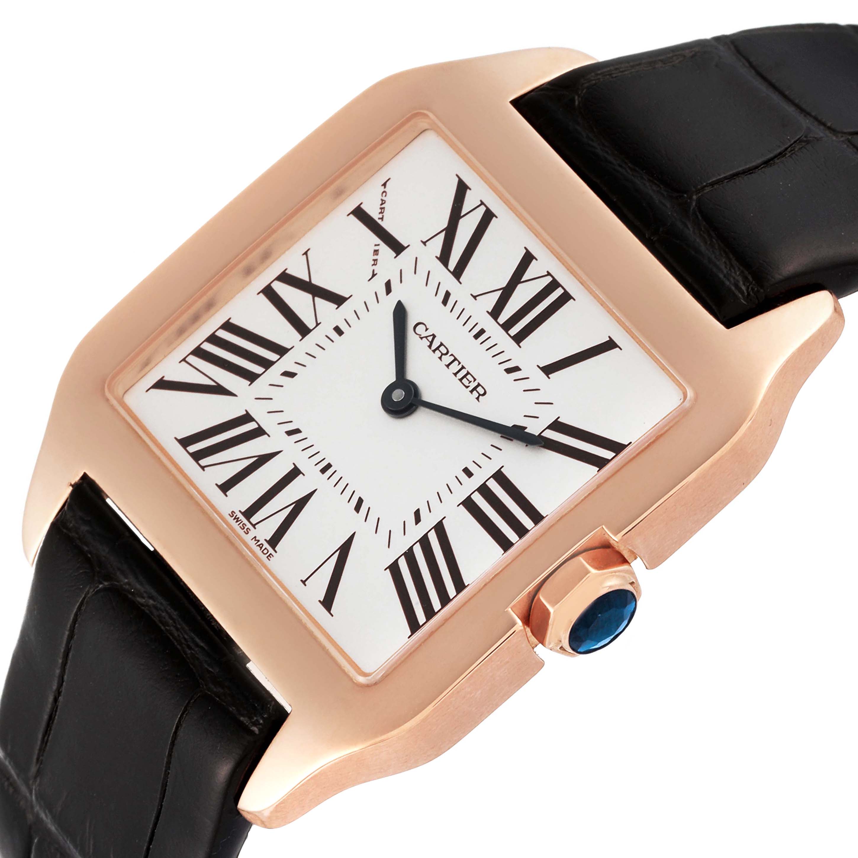 The image shows a close-up angled view of the Cartier Santos Dumont W2009251 Men's Rose Gold Silver Dial W2009251 Men's Rose Gold Silver Dial model, focusing on the dial and crown with a black strap.