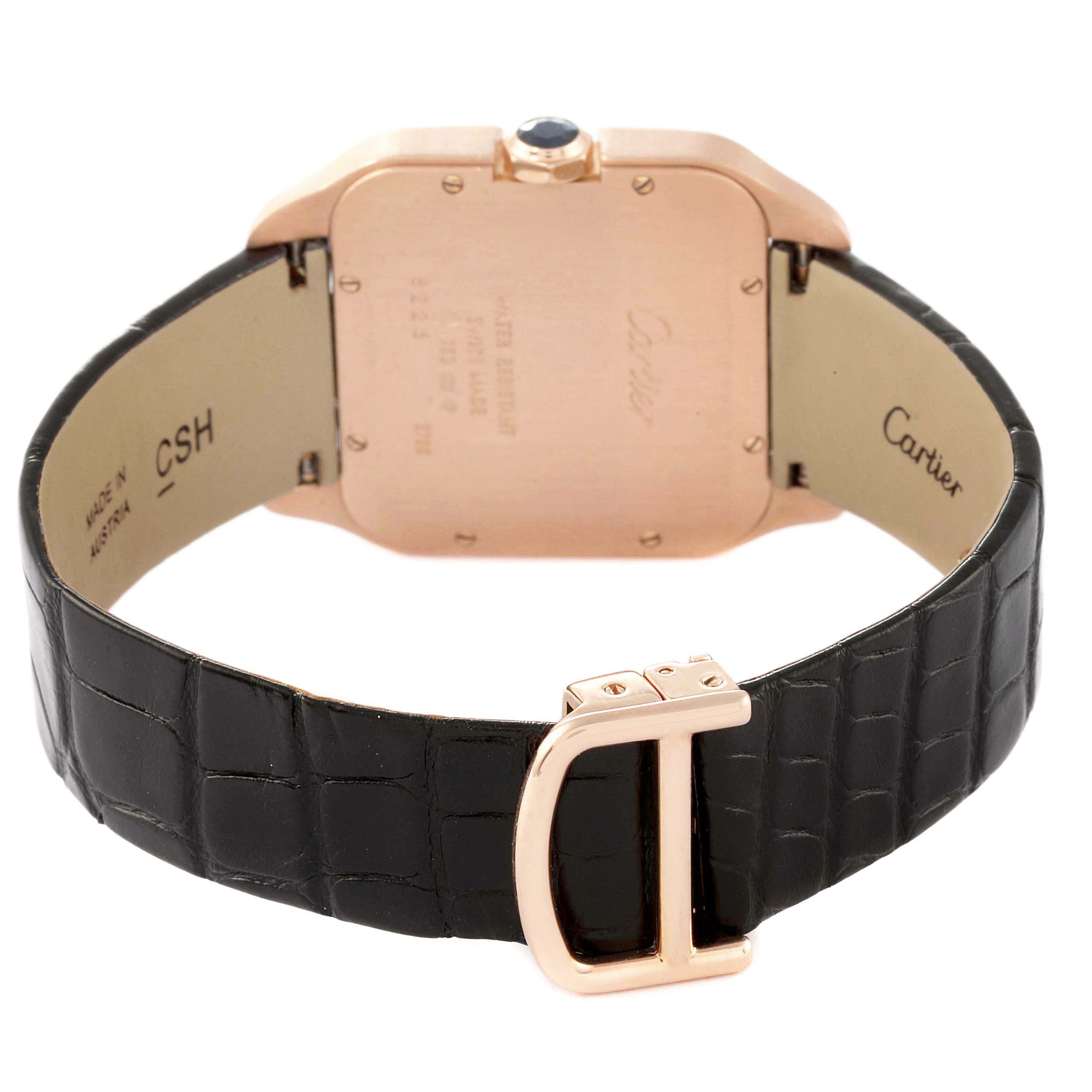 This image shows the back view of the Cartier Santos Dumont W2009251 Men's Rose Gold Silver Dial W2009251 Men's Rose Gold Silver Dial watch, featuring its leather strap, clasp, and case back.