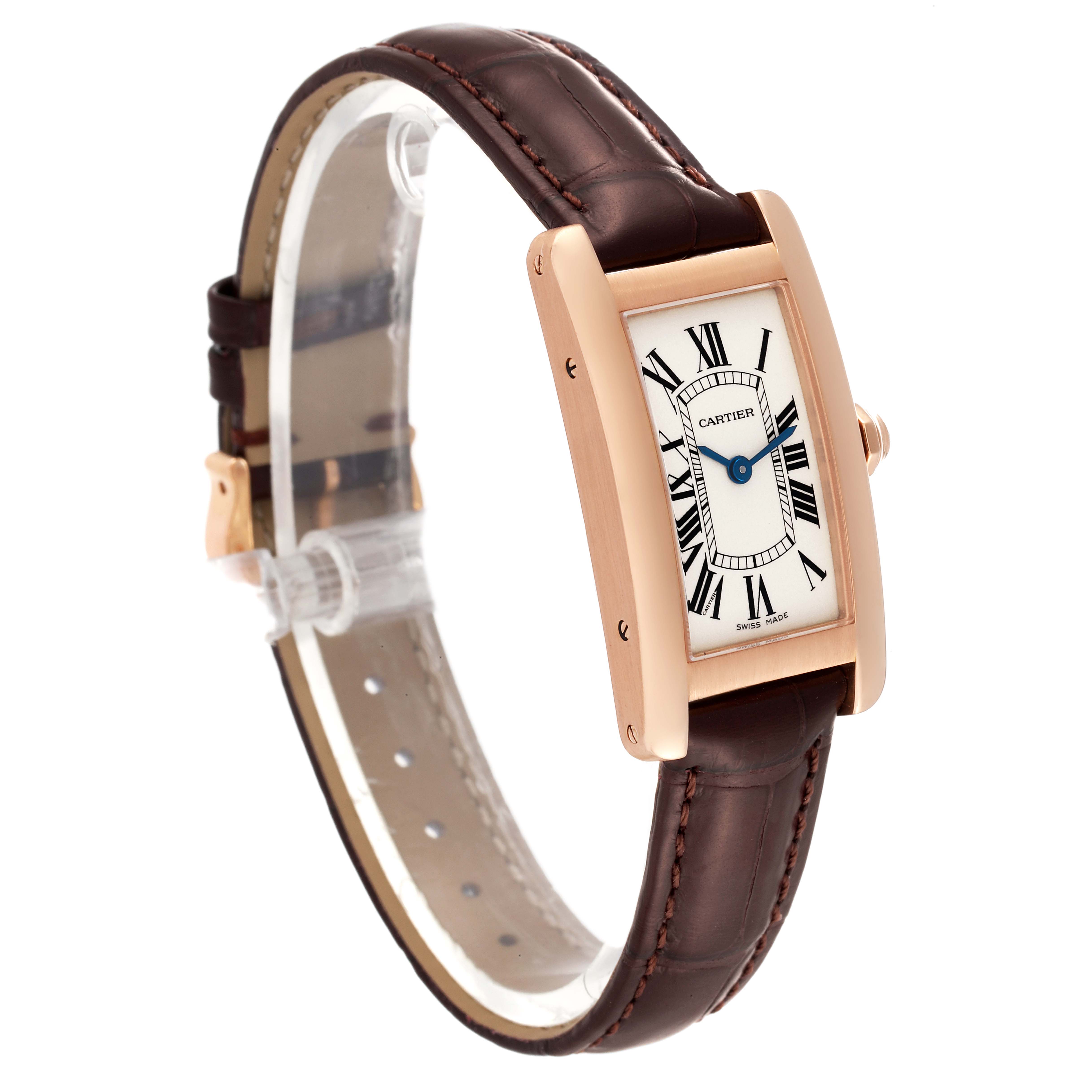This Cartier Tank Americaine W2607456 Women
s Rose Gold Silver Dial W2607456 Women
s Rose Gold Silver Dial watch is shown at a three-quarter front angle, displaying the face, case, and leather strap.