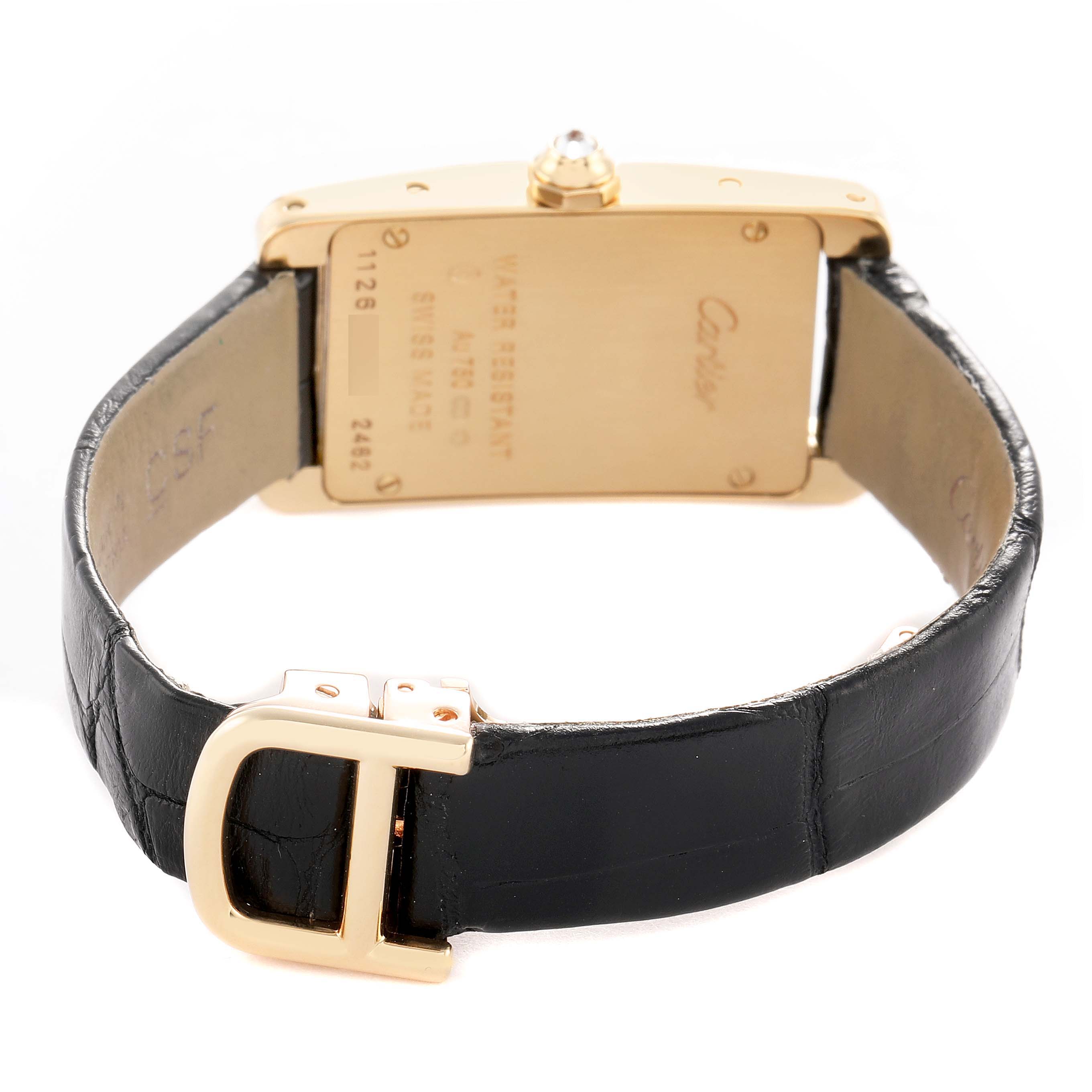 This image shows the back of a Cartier Tank Américaine watch, highlighting the case back, lugs, and leather strap with a clasp.