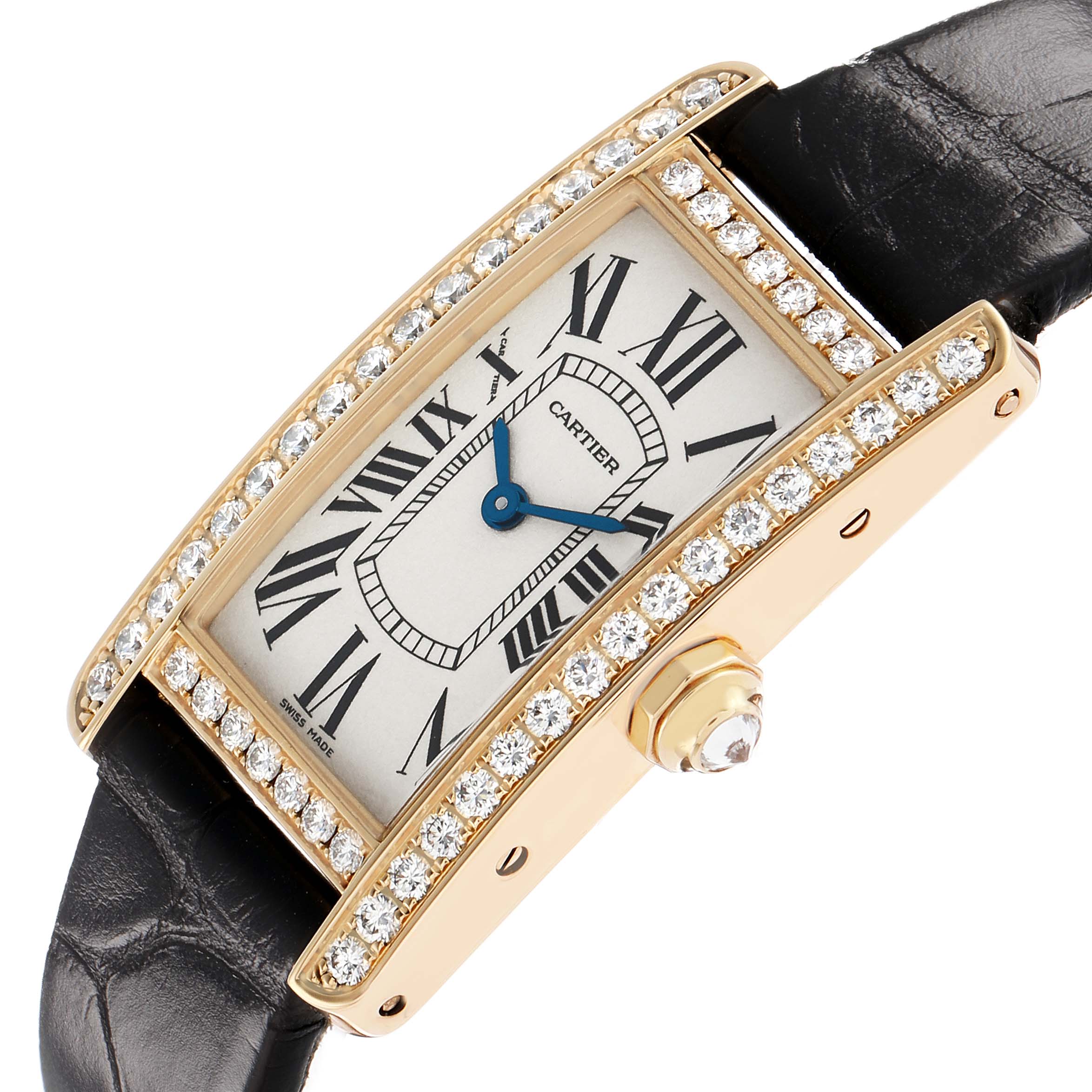 The Cartier Tank Americaine WB707231 Women's Yellow Gold Silver Dial watch is shown at an angled view, highlighting its diamond-encrusted bezel and leather strap.