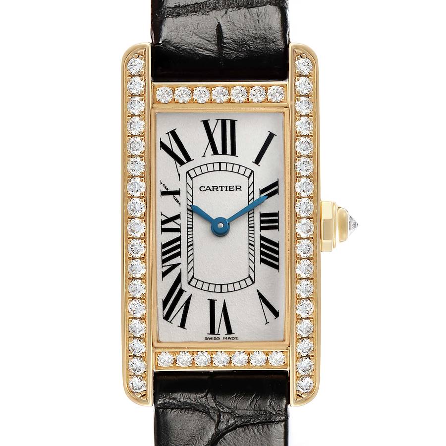 The Cartier Tank Americaine WB707231 Women's Yellow Gold Silver Dial watch is shown front-facing with a gold and diamond bezel, blue hands, and a black leather strap.