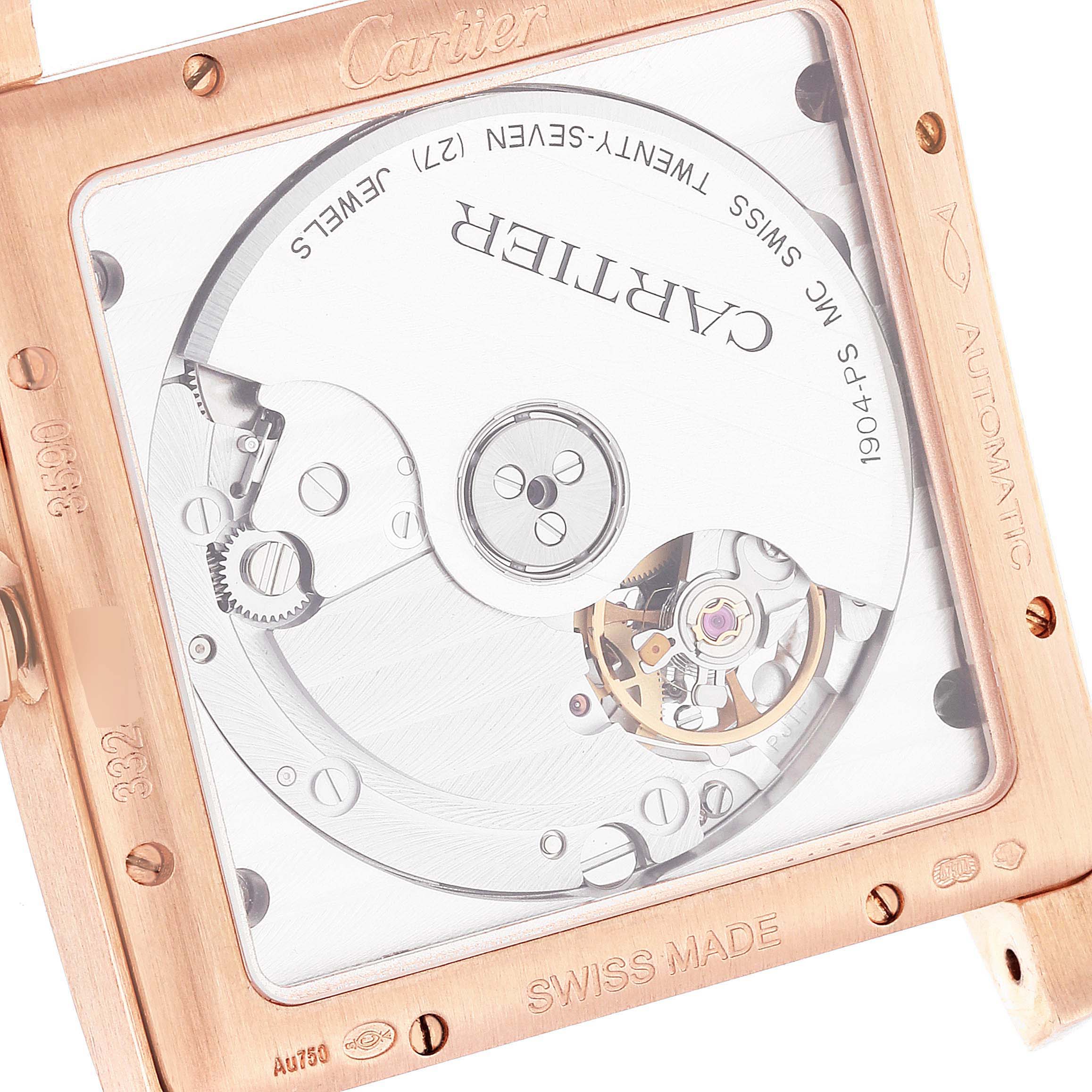 This image shows the back view of the Tank MC model by Cartier, revealing its intricate automatic movement and internal components.