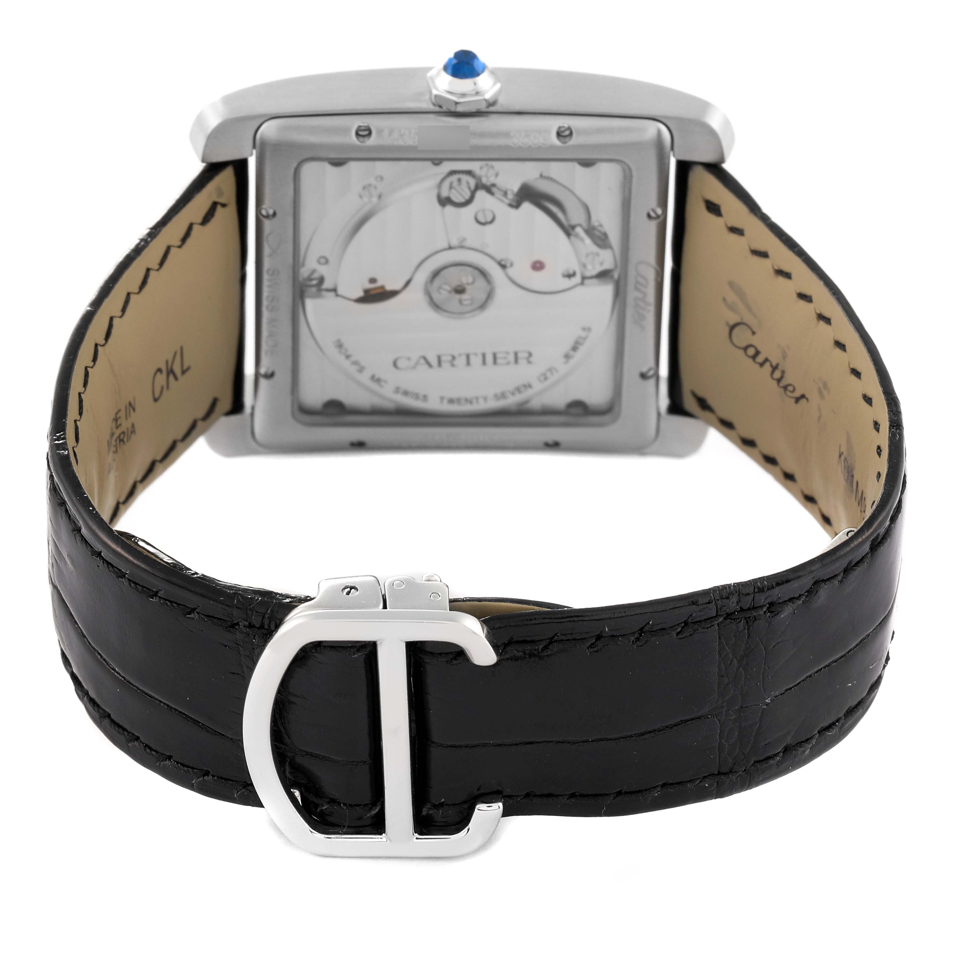 The image shows the back and strap of the Cartier Tank MC W5330003 Men
s Stainless Steel Silver Dial W5330003 Men
s Stainless Steel Silver Dial watch, highlighting its mechanical movement and buckle design.