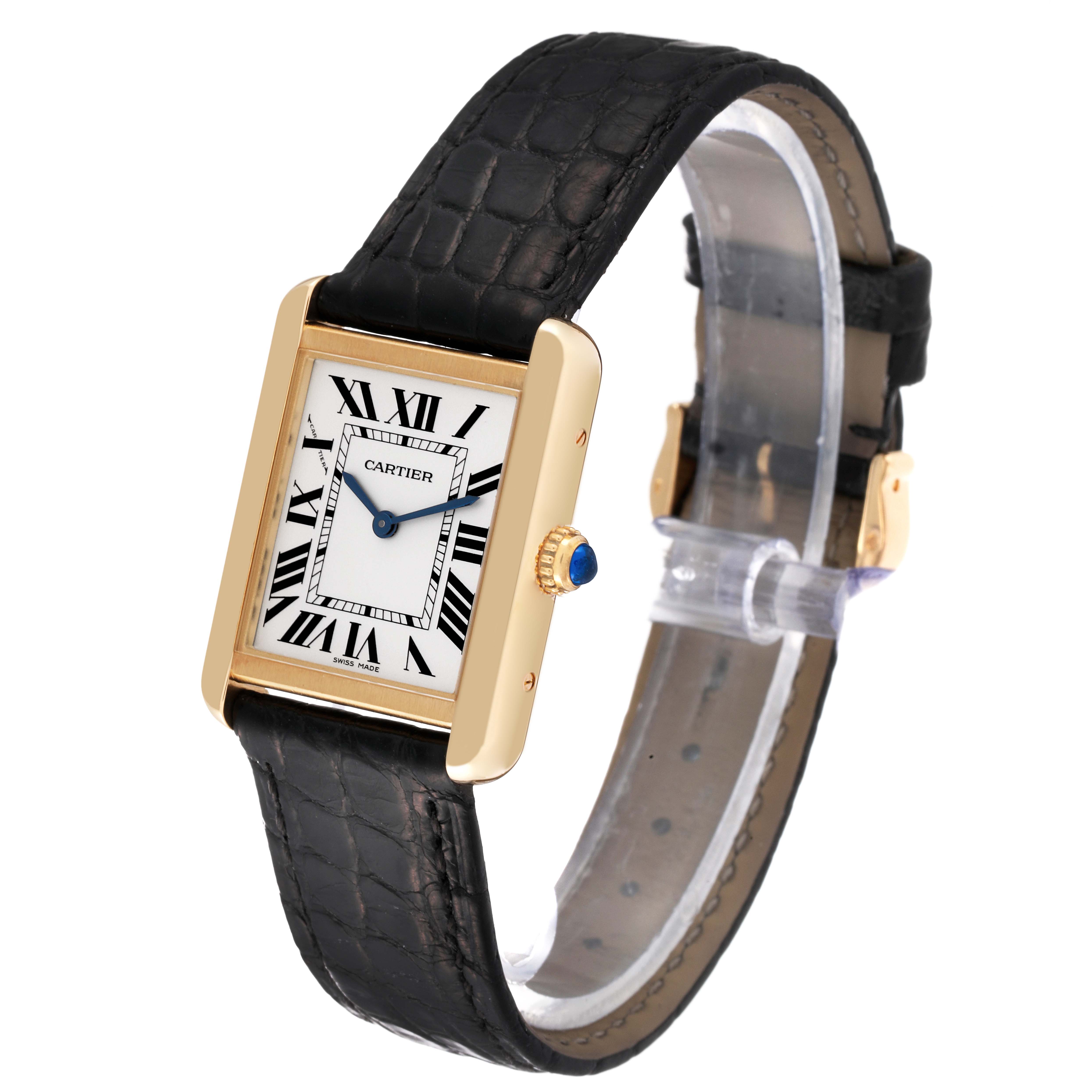 The image shows an angled view of a Cartier Tank Solo W5200002 Women
s Steel and Gold (two tone) Silver Dial W5200002 Women
s Steel and Gold (two tone) Silver Dial watch, highlighting the dial, case, crown, and leather strap.