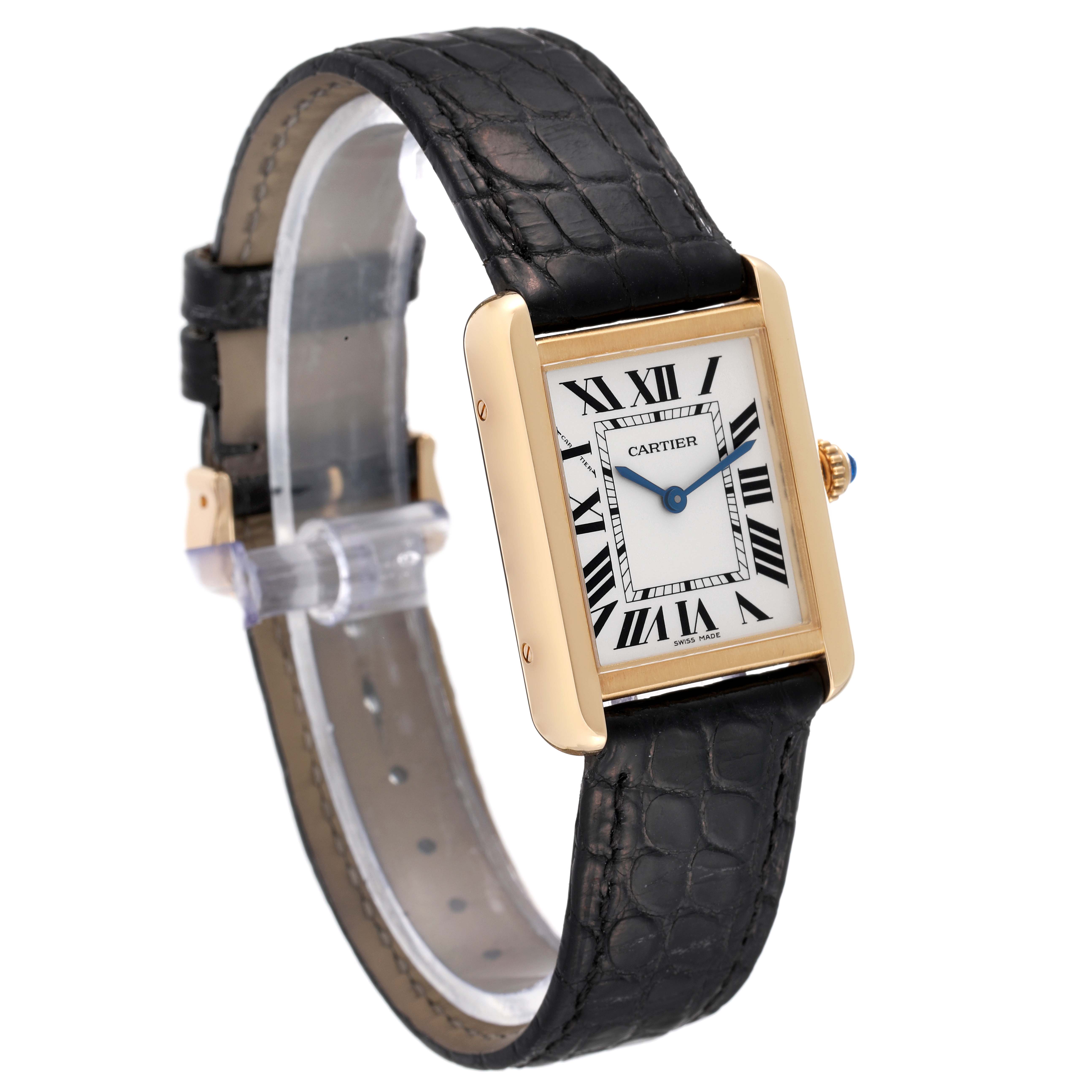 This image shows a side angle of the Cartier Tank Solo W5200002 Women
s Steel and Gold (two tone) Silver Dial W5200002 Women
s Steel and Gold (two tone) Silver Dial watch, highlighting its black leather strap and rectangular gold case.