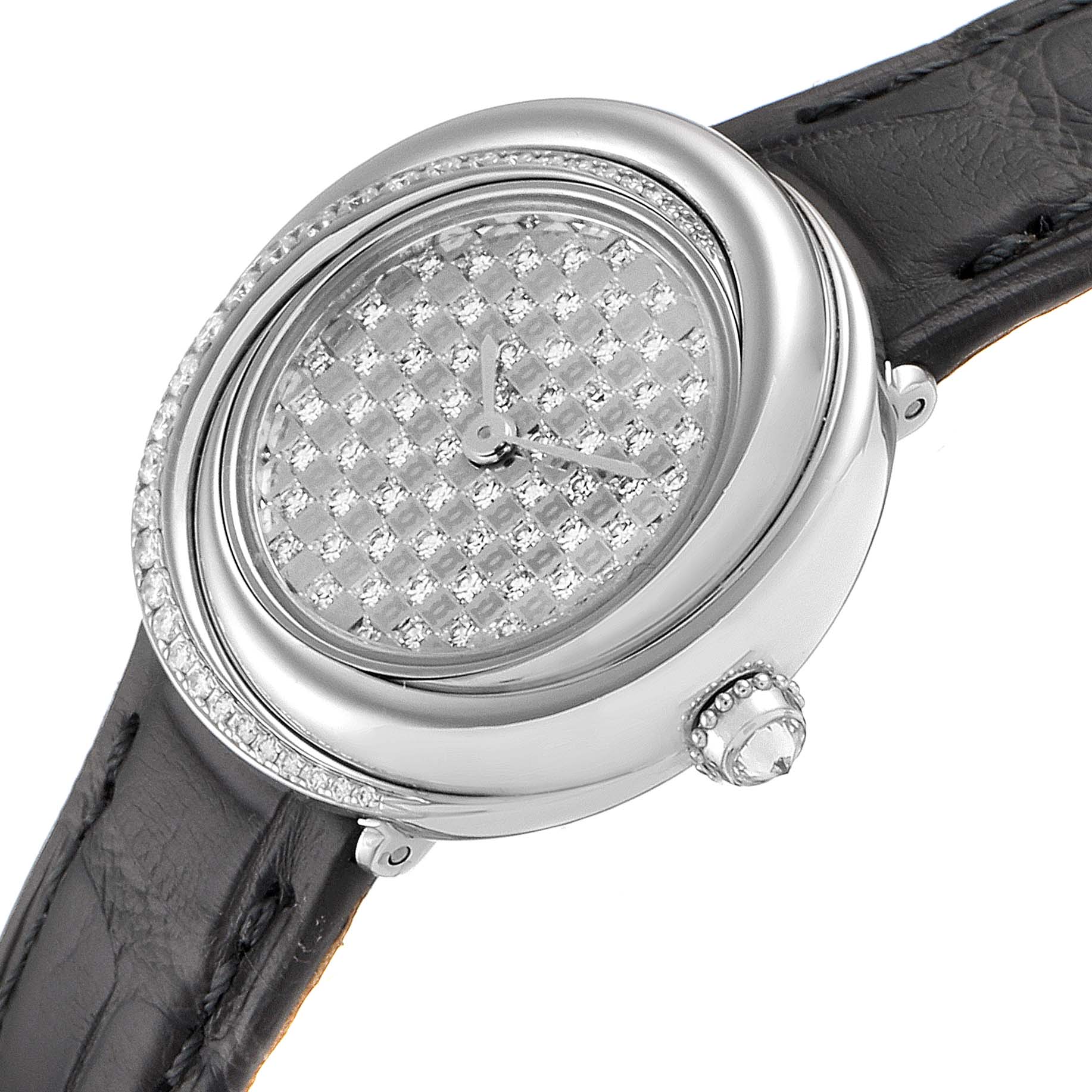 The Cartier Trinity 2444 Women's White Gold Silver Dial 2444 Women's White Gold Silver Dial watch is shown from an angled perspective, highlighting its diamond-studded face, bezel, and part of the black strap.