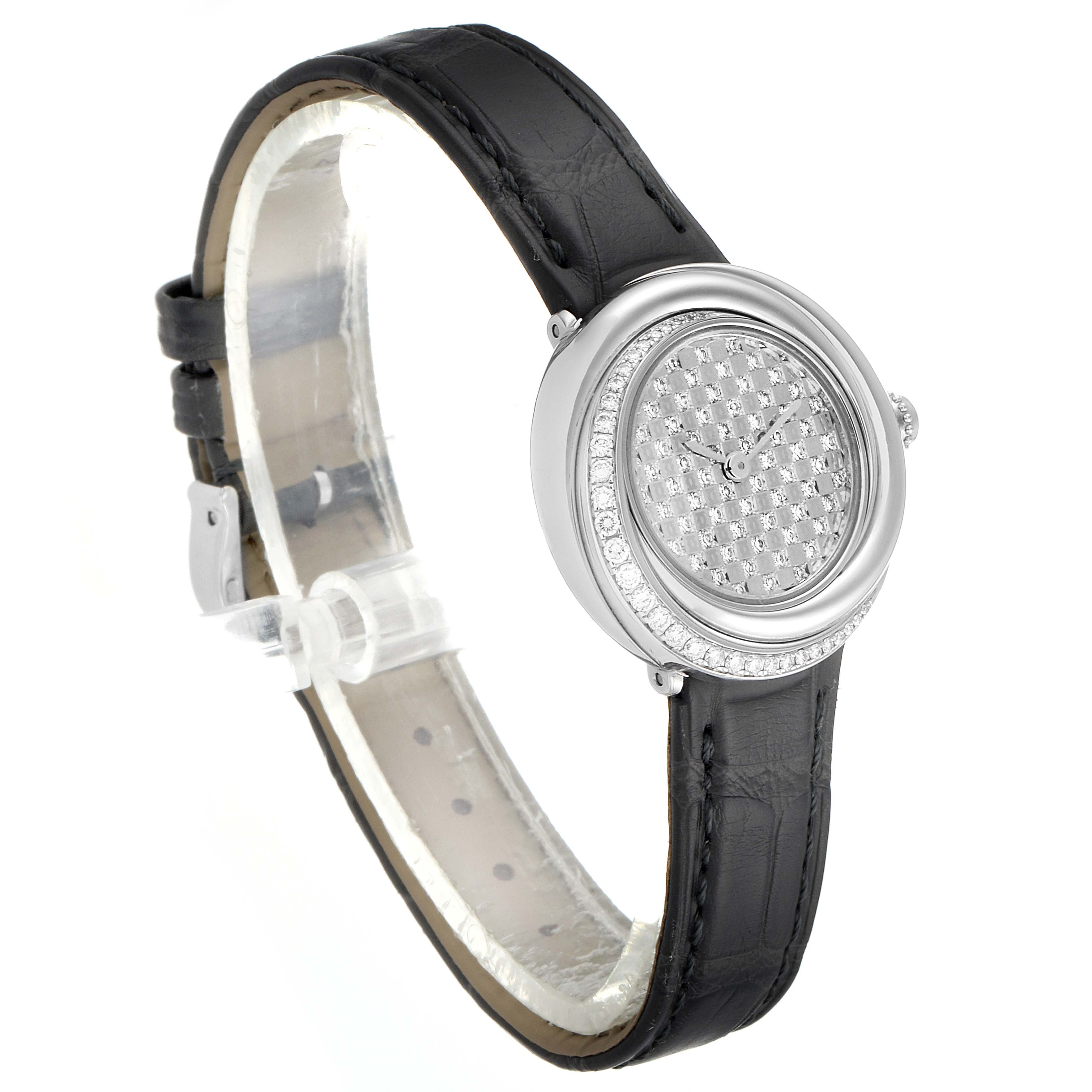 The Cartier Trinity 2444 Women's White Gold Silver Dial 2444 Women's White Gold Silver Dial model watch is shown from a three-quarter angle, highlighting the bezel, dial, case, and black leather strap.