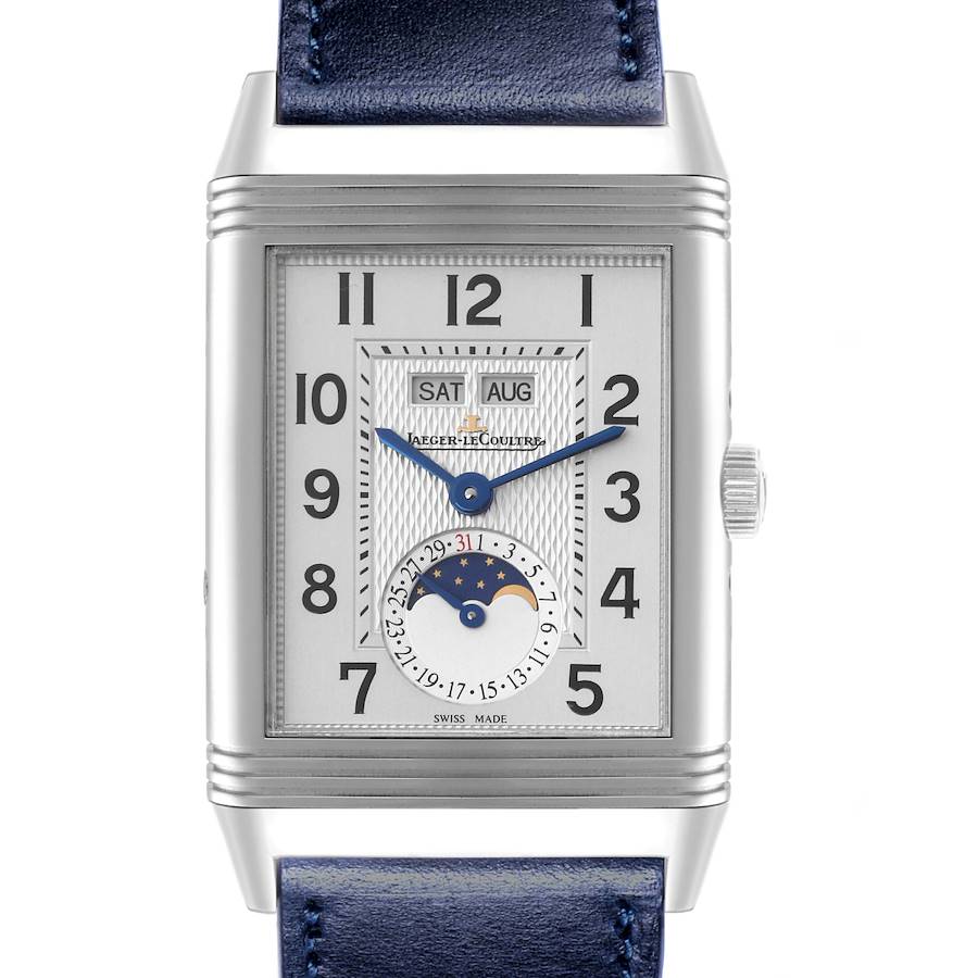 The Jaeger LeCoultre Reverso model is shown from the front, displaying its dial, hands, calendar, and phase of the moon.