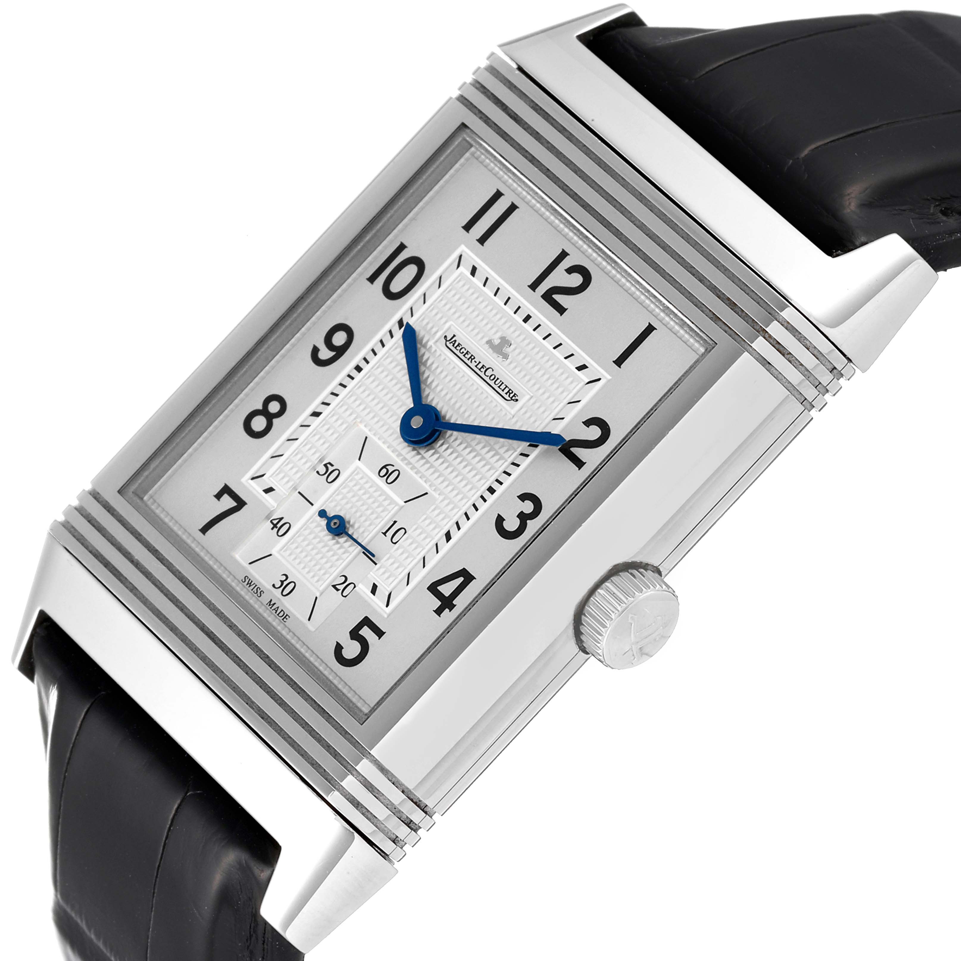 This Jaeger-LeCoultre Reverso watch is shown at an oblique angle, featuring the dial, crown, and leather strap.