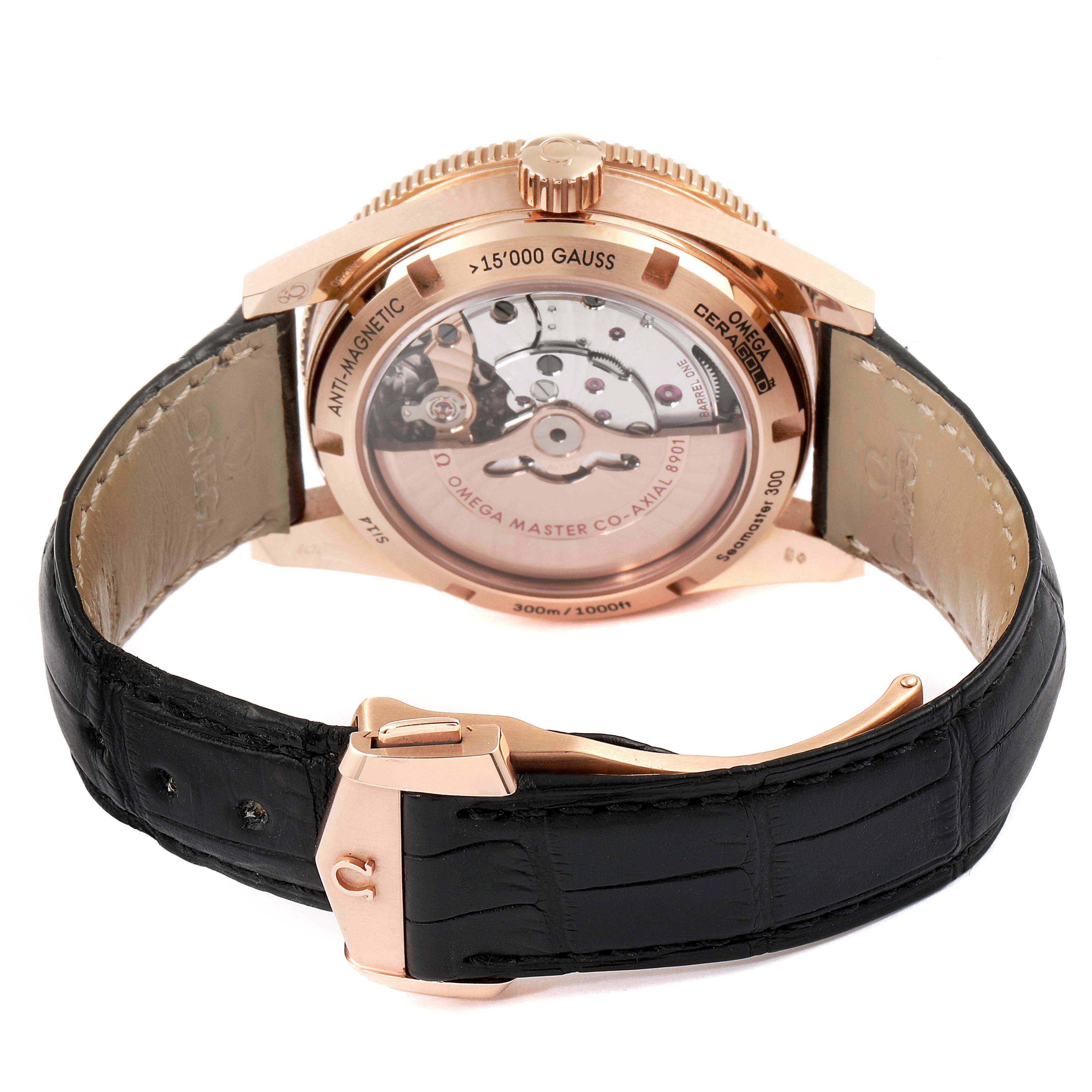 The image shows the back view of the Omega Seamaster 233.62.41.21.01.002 Men's Rose Gold Black Dial 233.62.41.21.01.002 Men's Rose Gold Black Dial watch, highlighting the movement and black leather strap with a clasp.