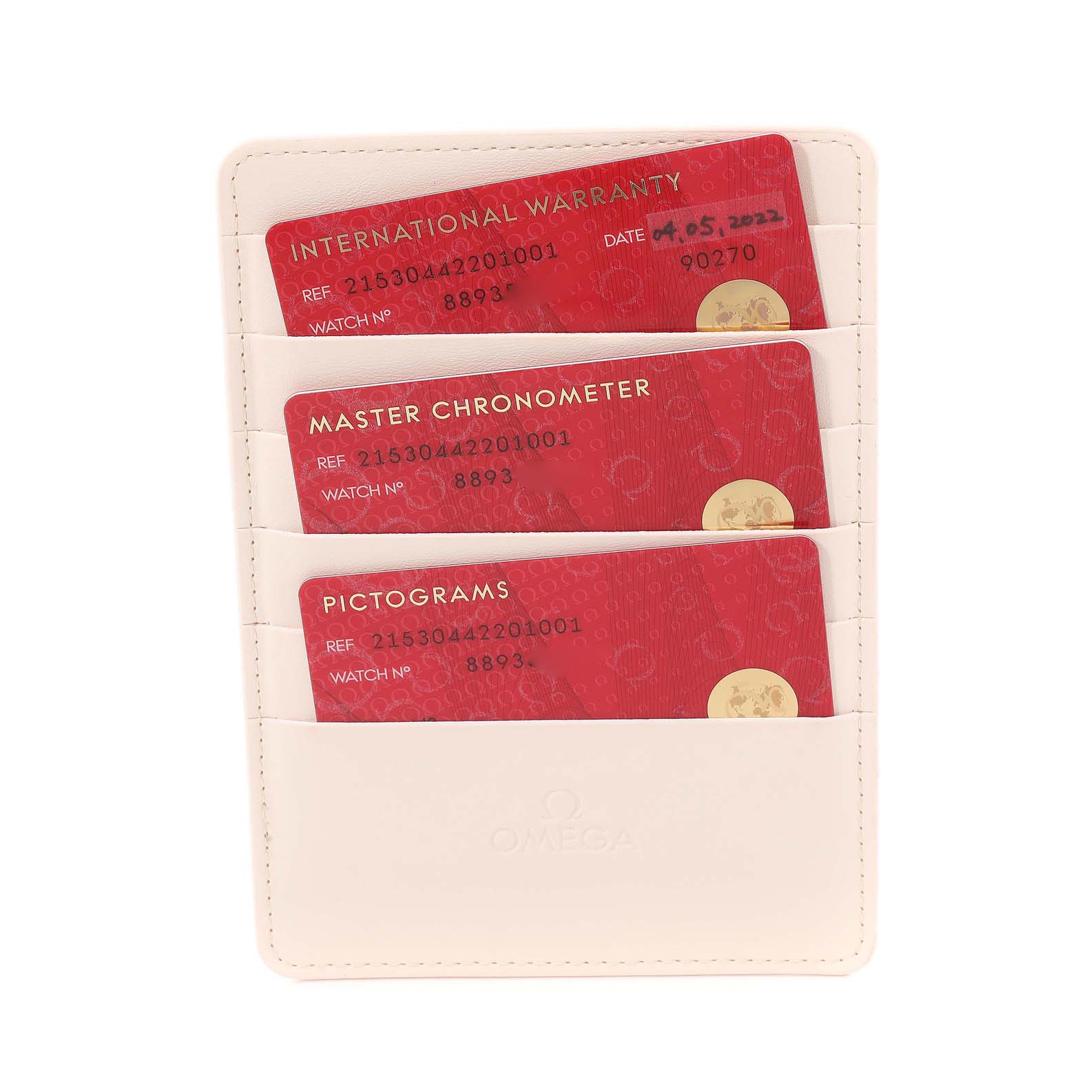 The image shows the warranty and certification cards for an Omega Planet Ocean 215.30.44.22.01.001 Men
s Stainless Steel Black Dial 215.30.44.22.01.001 Men
s Stainless Steel Black Dial model neatly organized in a holder.