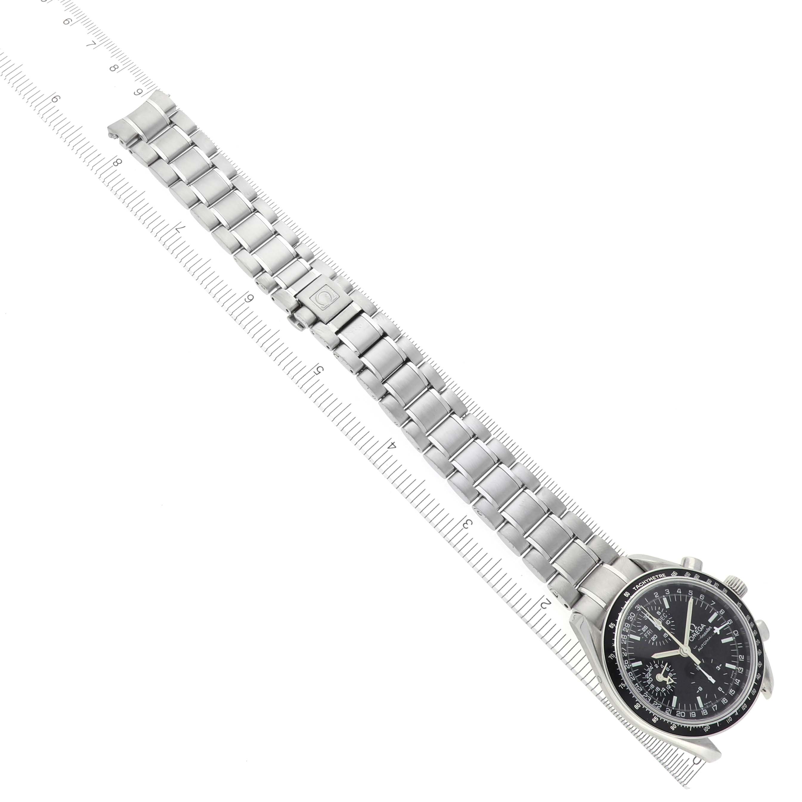 The Omega Speedmaster 3520.50.00 Men
s Stainless Steel Black Dial 3520.50.00 Men
s Stainless Steel Black Dial watch is shown at an angle displaying the face and entire bracelet, alongside a ruler for scale.