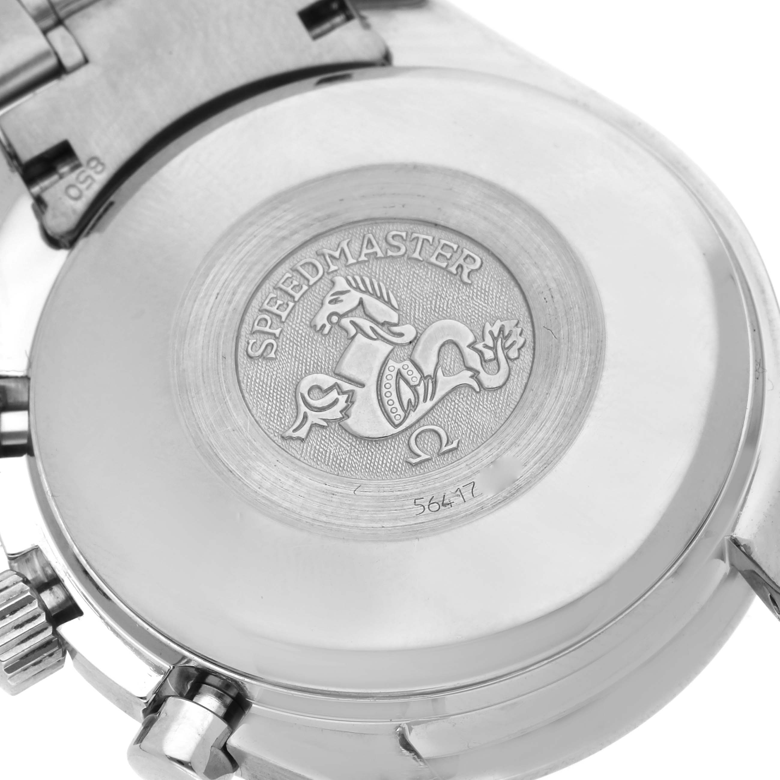 The image shows the back case of an Omega Speedmaster 3520.50.00 Men
s Stainless Steel Black Dial 3520.50.00 Men
s Stainless Steel Black Dial, highlighting the engraved logo and bracelet attachment.