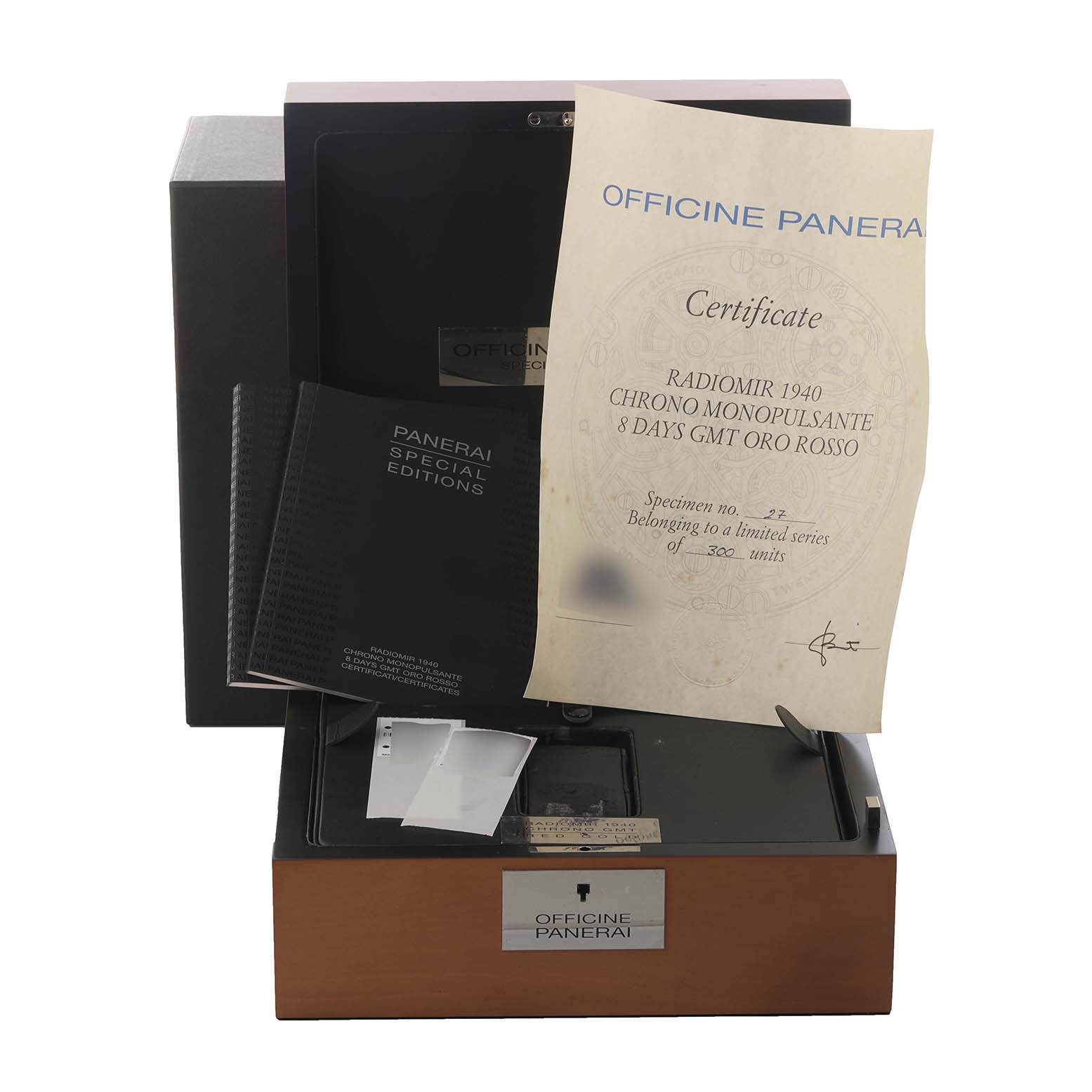 The image shows an angled view of Panerai Luminor's packaging, certificate, and accessories, but not the watch itself.