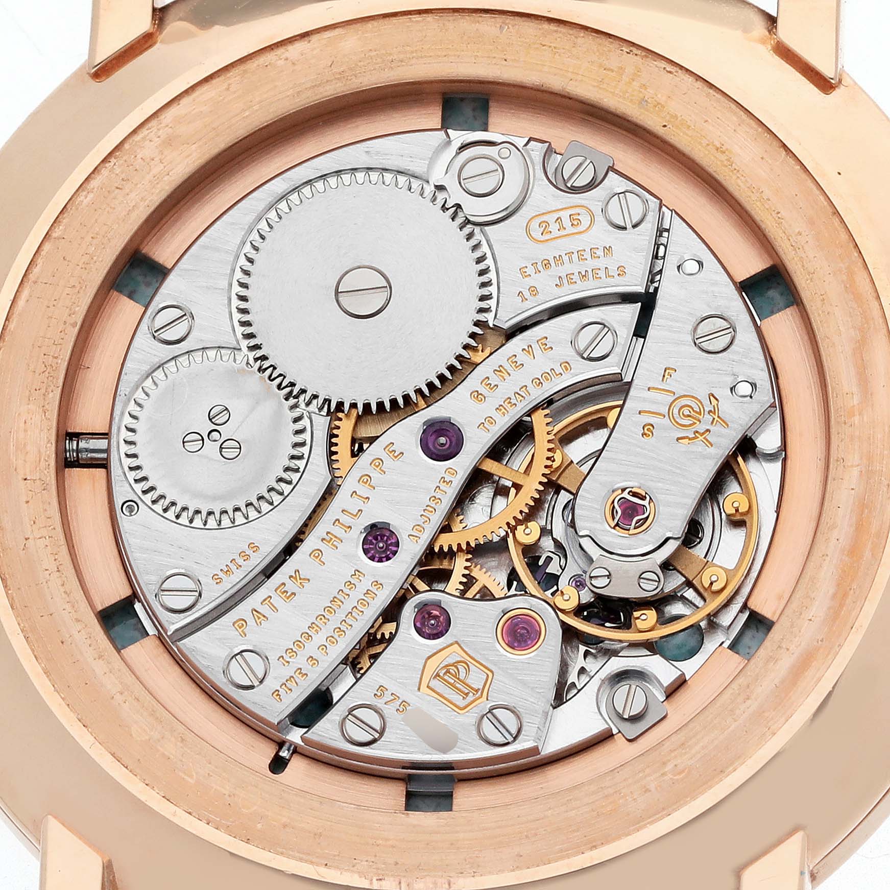 The image shows the back view of the Patek Philippe Calatrava 5116R Men's Rose Gold White Dial, highlighting its intricate mechanical movement.