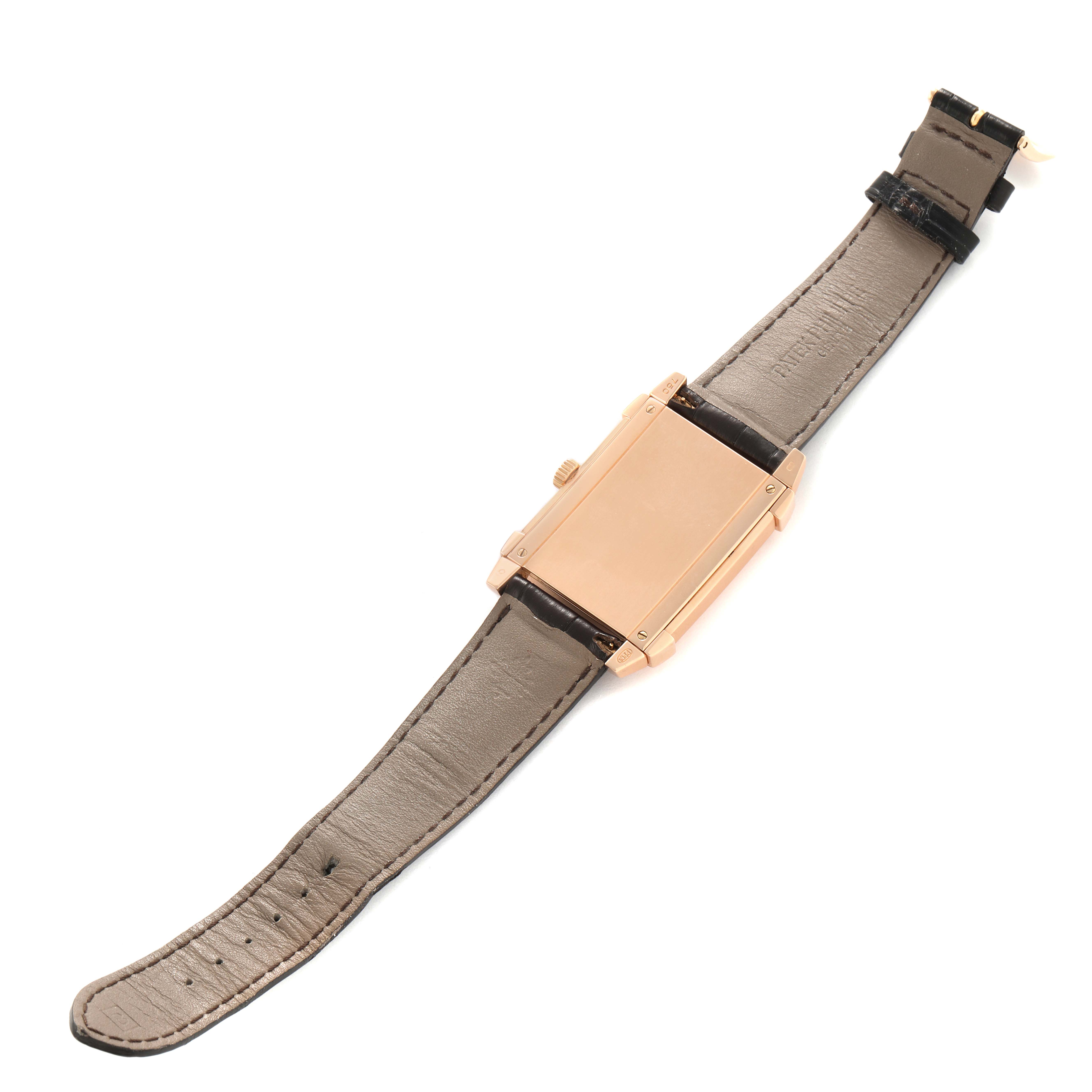 The image shows the back and strap of a Patek Philippe Gondolo 5111 5111R Men's Rose Gold Silver Dial watch from a top-down angle.