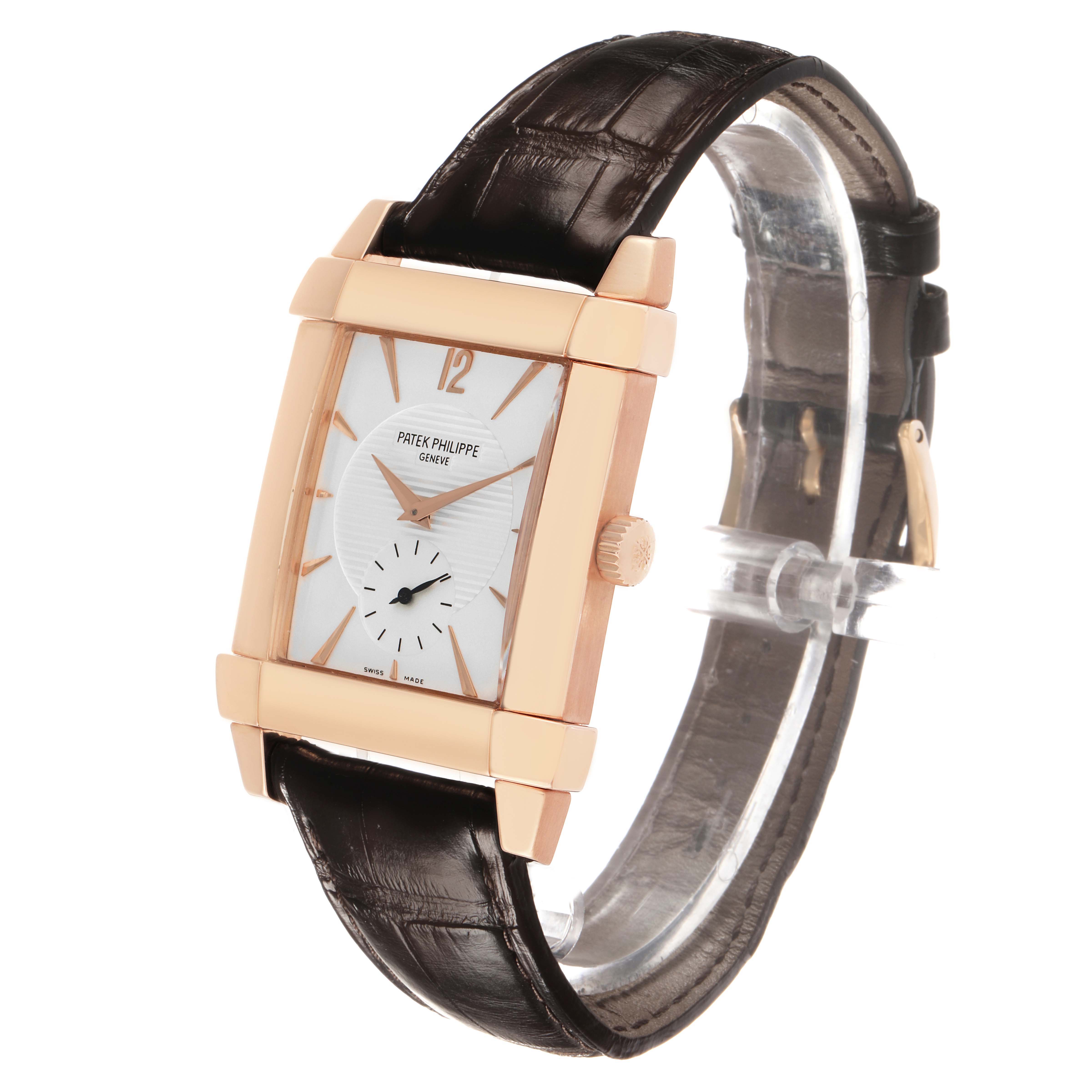 The Patek Philippe Gondolo 5111 5111R Men's Rose Gold Silver Dial watch is shown at a three-quarter angle highlighting its square case, dial, and leather strap.
