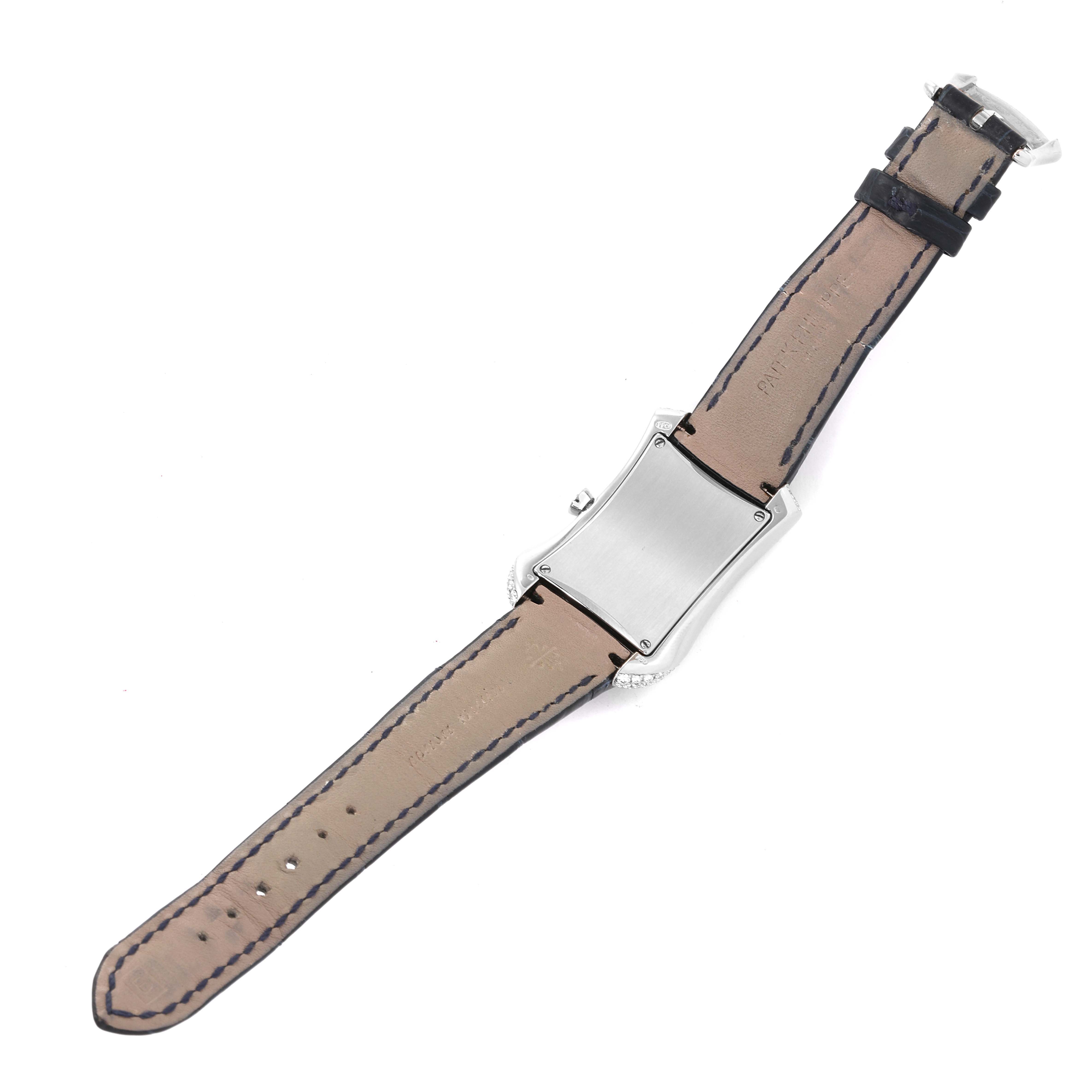 The image shows the back view of a Patek Philippe Gondolo 4972G-001 Women's White Gold Mother of Pearl Dial watch, highlighting the case back and leather strap.