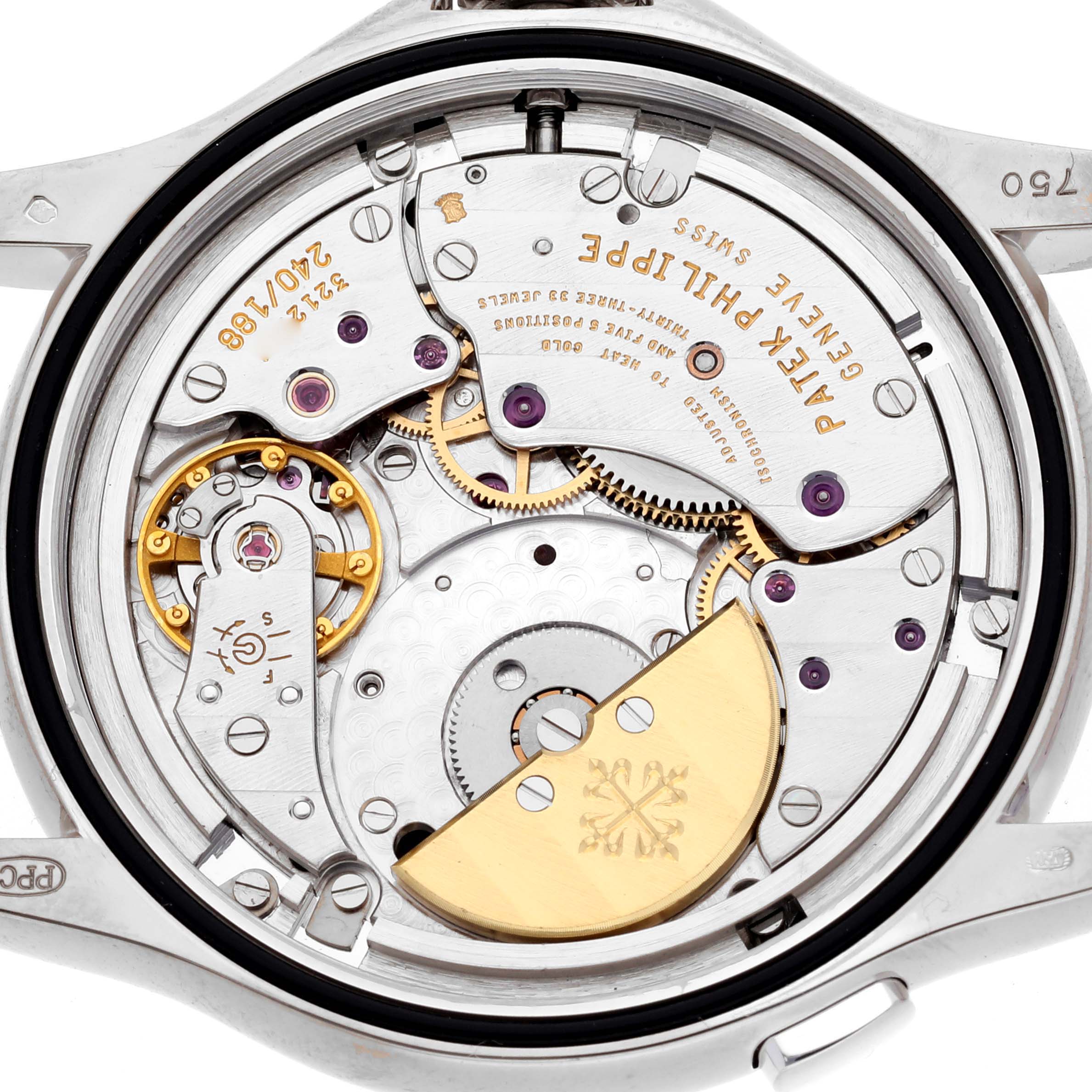 The image shows the movement view of the Patek Philippe Complications 5110G-001 Men's White Gold Silver Dial 5110G-001 Men's White Gold Silver Dial, highlighting gears and the rotor.