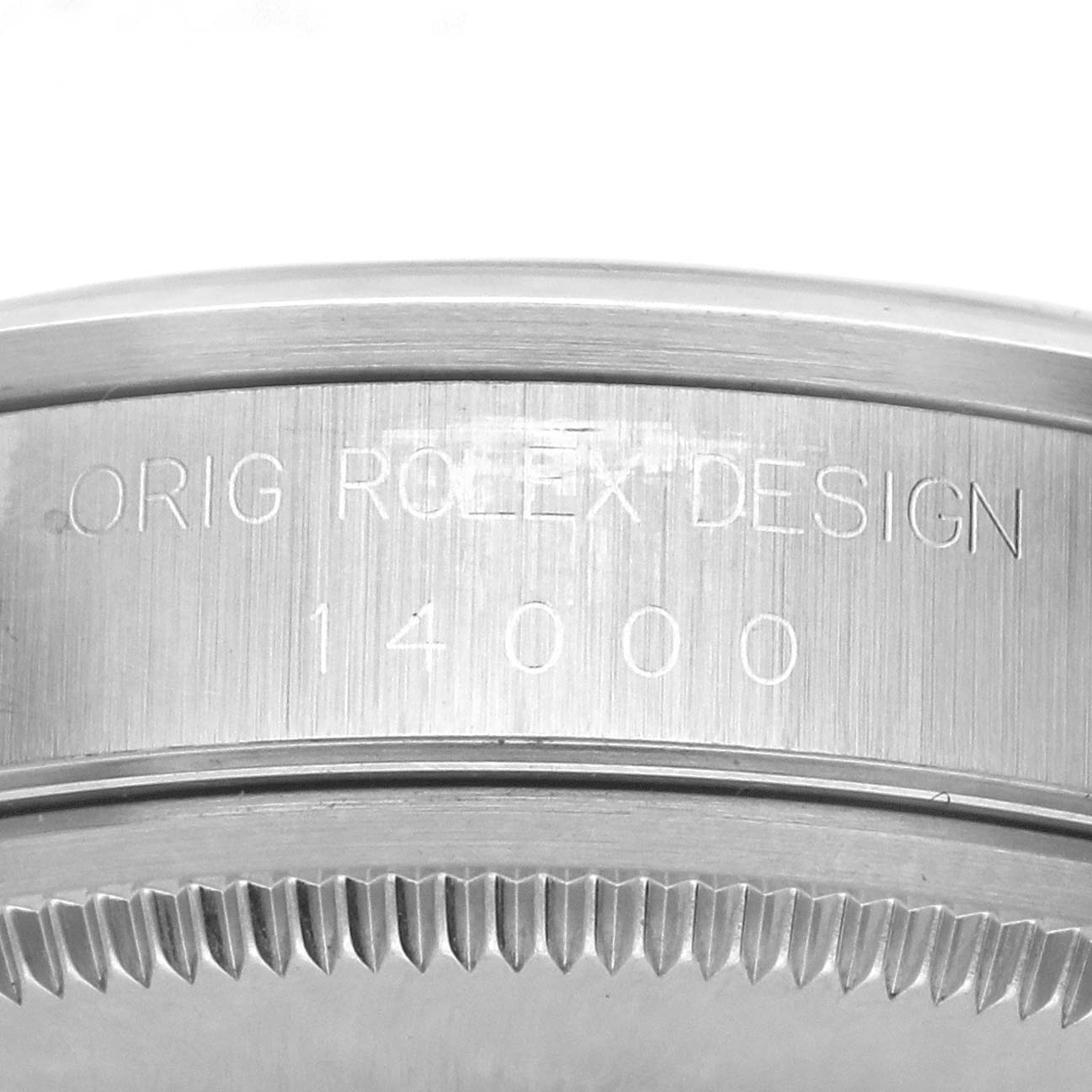 The image shows the side view of a Rolex Air-King 14000M Men's Stainless Steel Black Dial 14000M Men's Stainless Steel Black Dial watch's bezel with the model number engraved.
